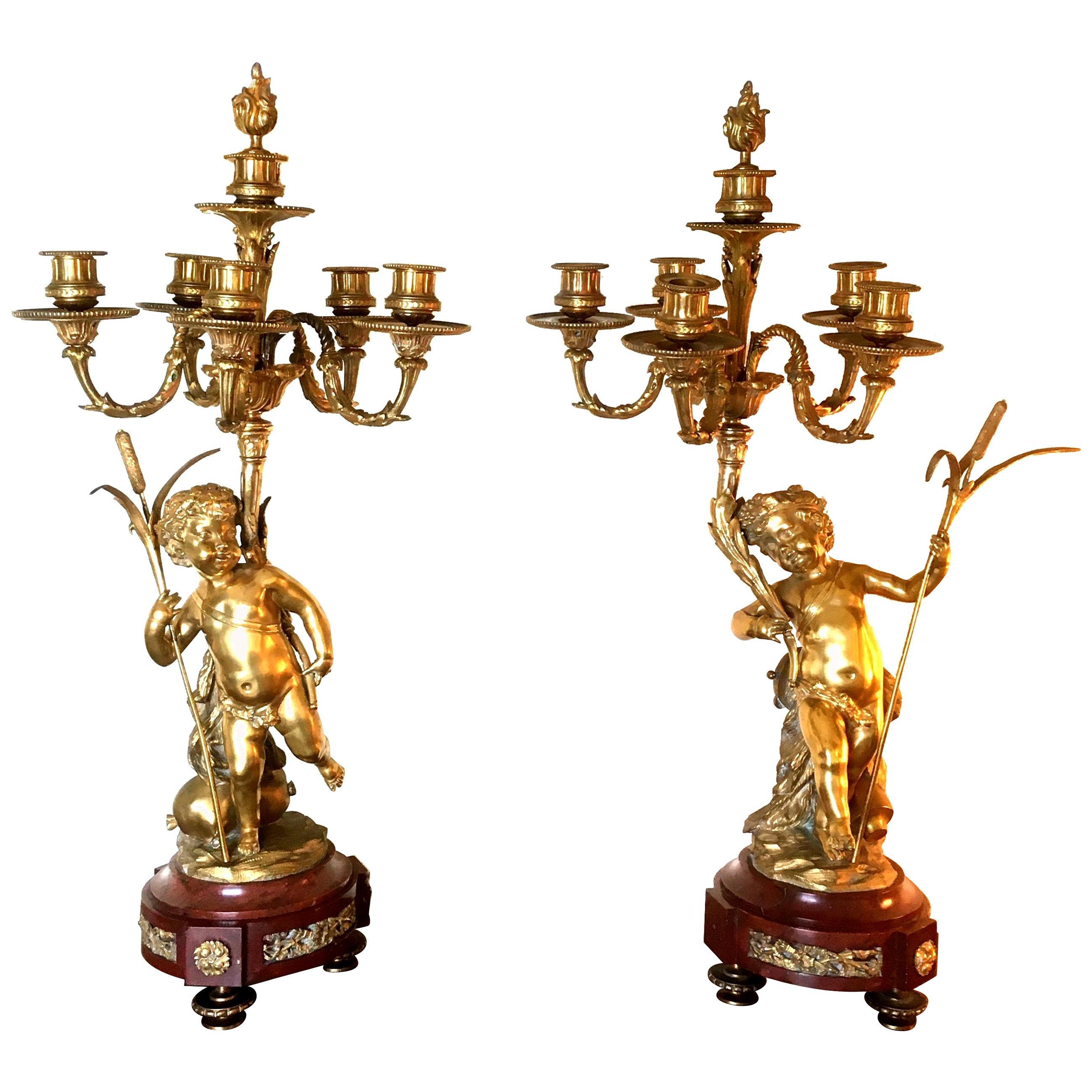 CLODION - Paire de candélabres en bronze doré et marbre rouge avec Putti - 19ème France