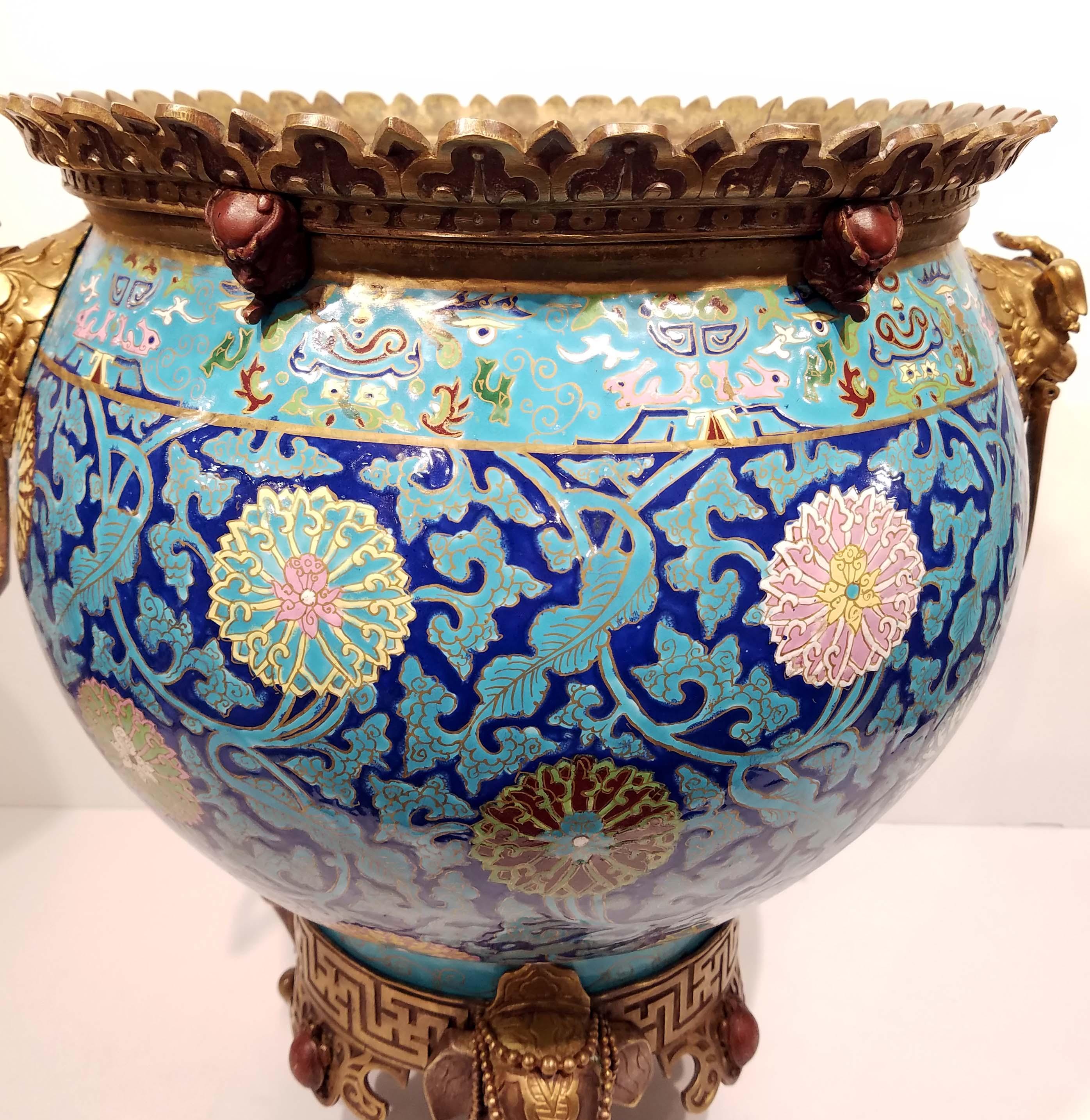 A massive jardinière/ planter attributed to Escalier De crystal, Paris, 19th century. Soft paste porcelain with gilt and polychromed bronze mounts of elephants, turtle and foodogs in the style of Chinese cloisonné from Ming dynasty. Measures: