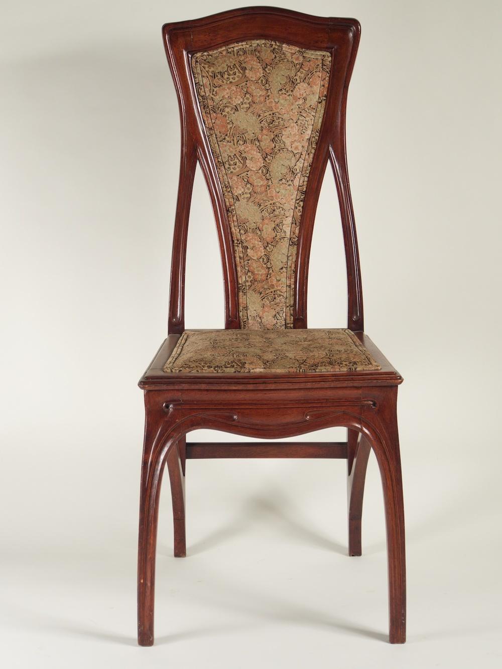 French Art Nouveau pair of side chairs attributed to Eugene Gaillard, circa 1900. Sculpted mahogany with Bachhausen velvet re-issued Art Nouveau pattern fabric. Measures: 17