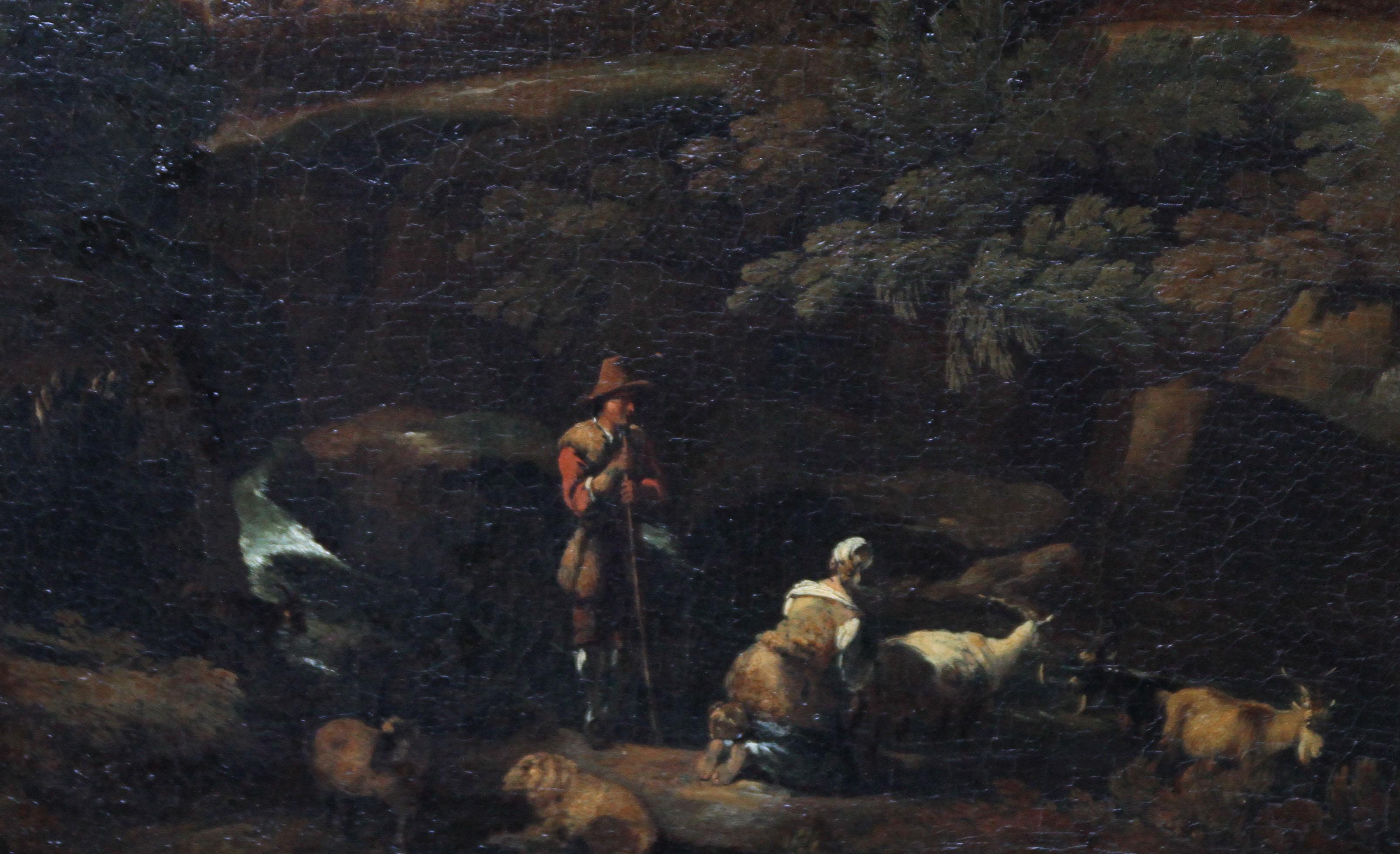 Délicat capriccio de paysage à l'huile sur toile représentant un paysage arcadien avec des personnages et des moutons et chèvres au premier plan. Un ciel d'orage et des arbres détruits peuplent le paysage et les personnages sont très raffinés et