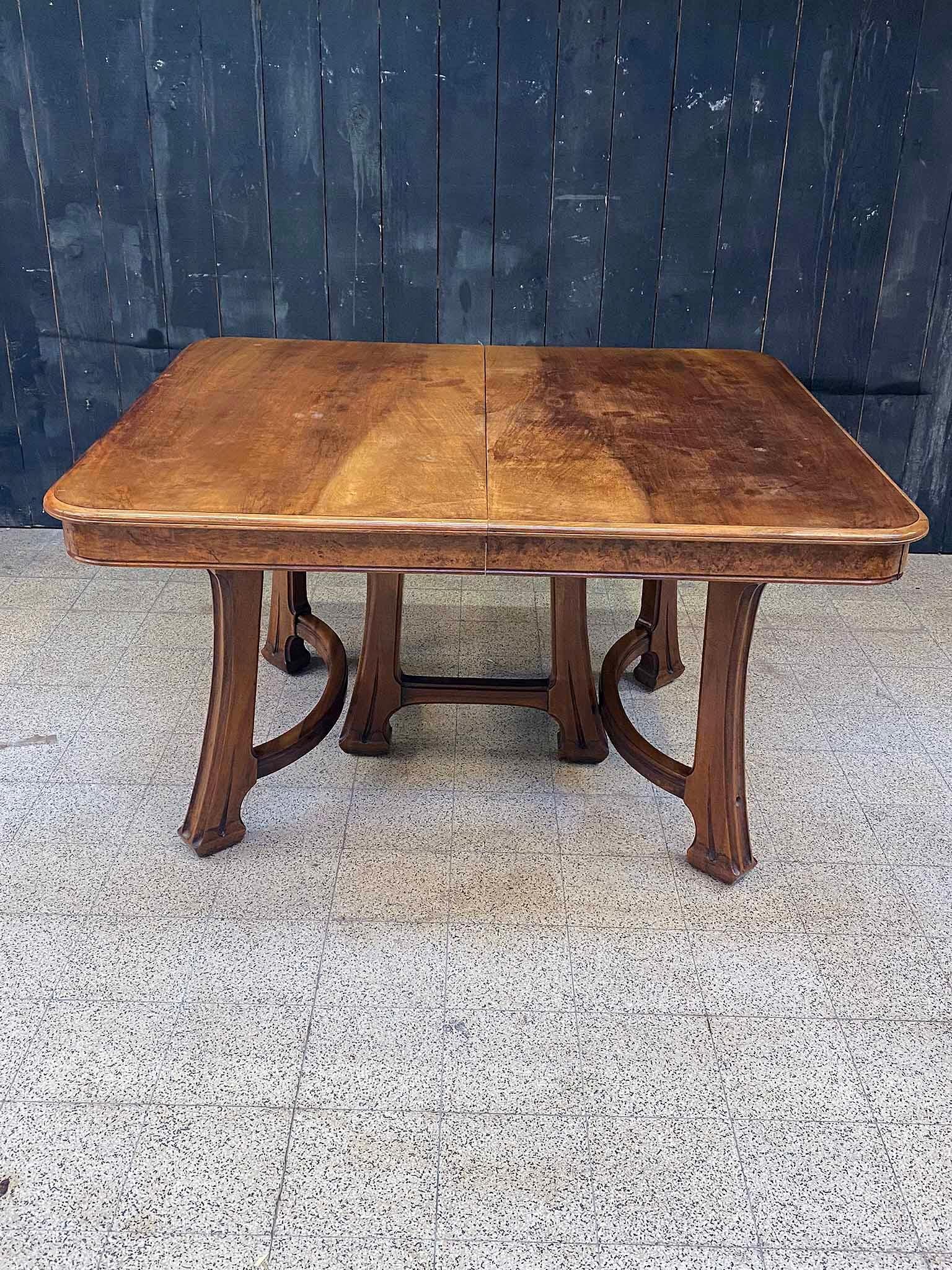 Attributed to Gauthier-Poinsignon & Cie, dining room table in walnut and elm burl veneer.
Table measures: 115 x 131 cm, H. 74.5 cm.
Varnish to be redone, extensions in raw wood.
6 Chairs and 2 buffets on the model available.
 