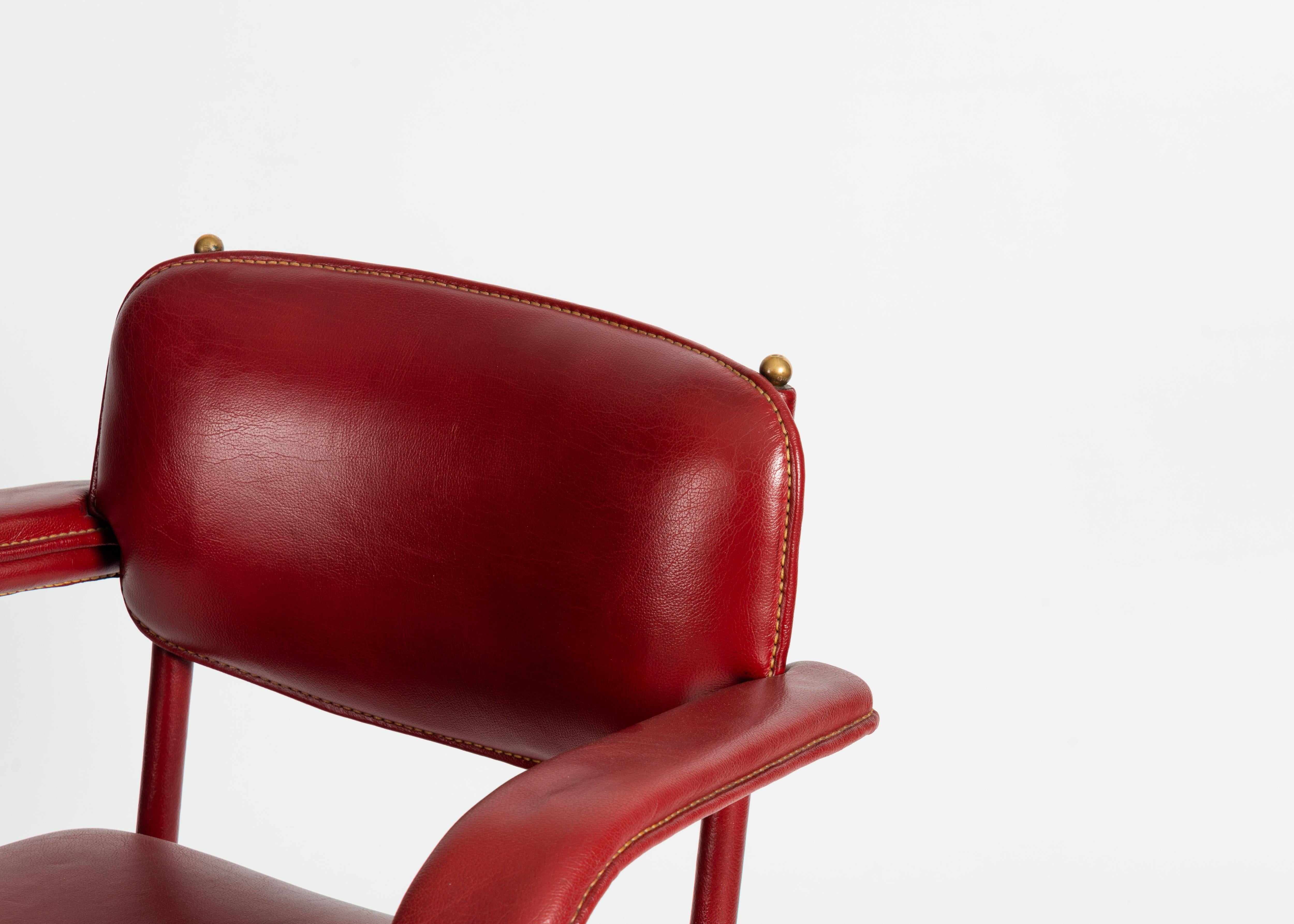 French Attributed to Jacques Adnet, Red Leather Armchair, France, circa 1950