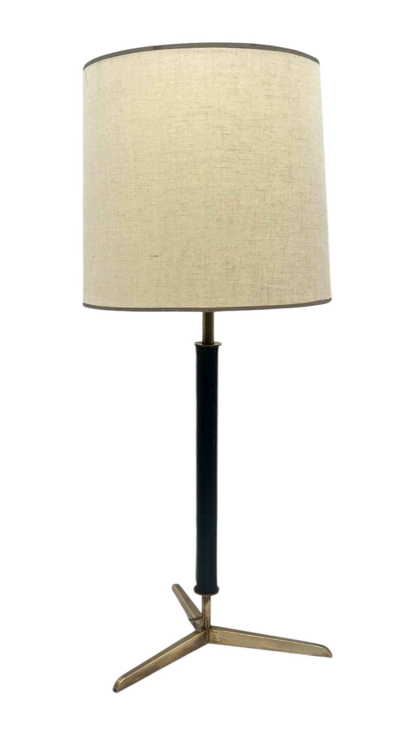 Attributed to Jacques Adnet. 1950's, France. Stitched Black Leather & Brass Table Lamp. Overall great vintage condition with age appropriate wear to leather and brass. Measures 22