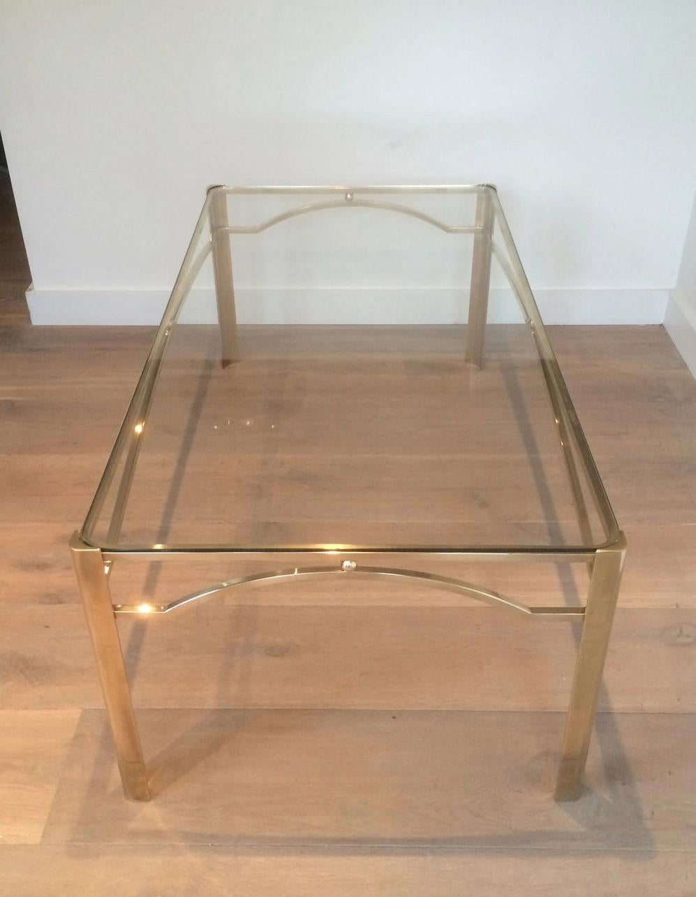 This bronze coffee table is attributed to Jacques Quinet. This cocktail table which quality is really good, was made by the famous French maker Maison Mallabert and is signed Broncz and numbered, circa 1970.