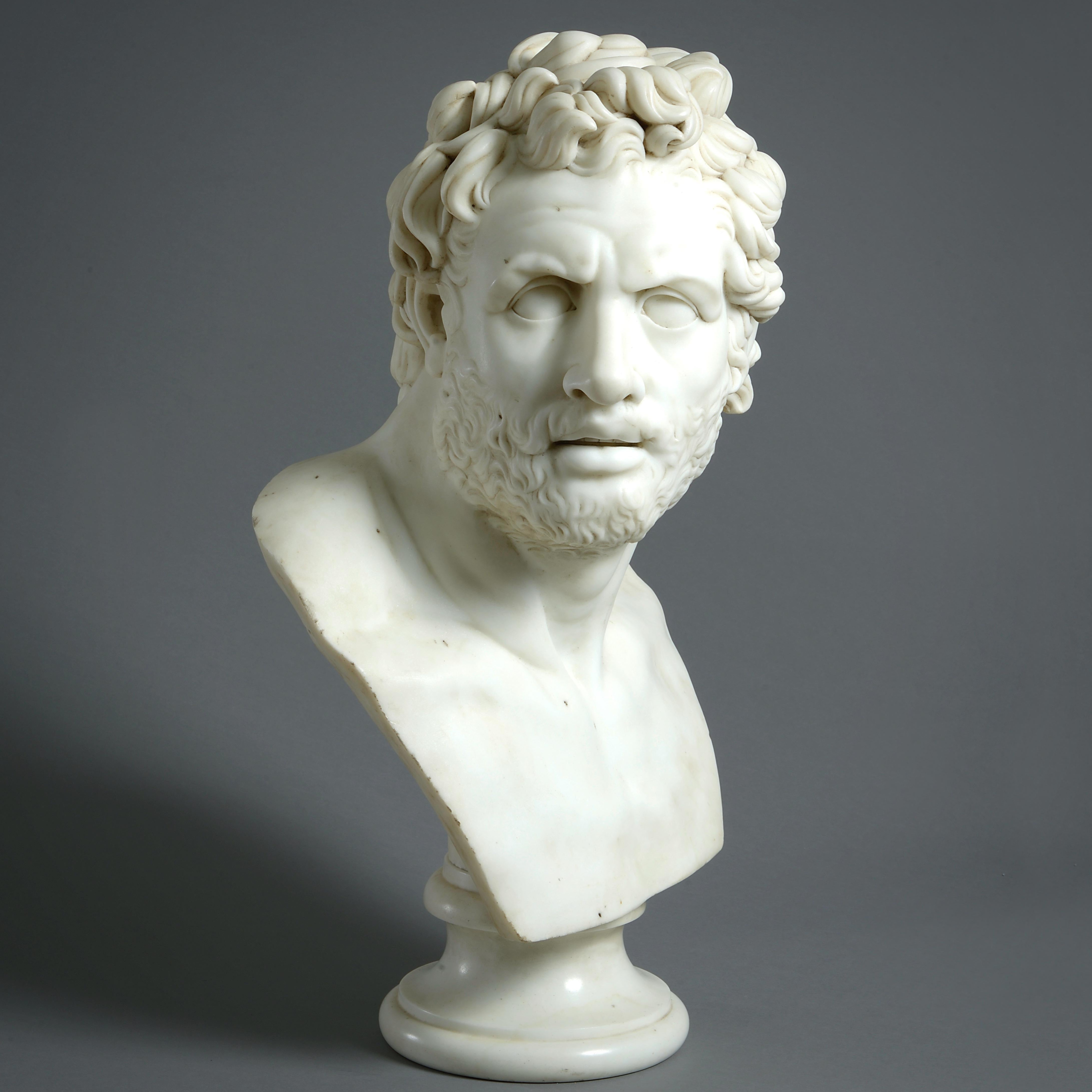 A COMPANION OF ULYSSES, AFTER THE ANTIQUE BUST IN THE TOWNLEY COLLECTION, NOW IN THE BRITISH MUSEUM, LATE 18TH CENTURY.

Statuary Marble.

This bust is a late 18th century English copy after the antique bust excavated from Hadrian’s Villa in 1769