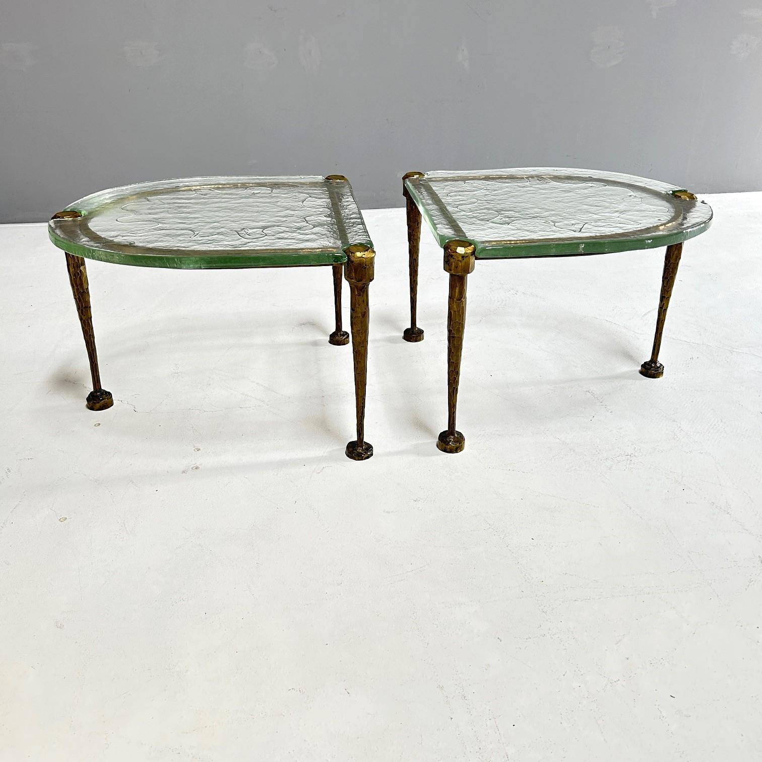 The frame of the two tables is made of bronze.
This bronze alloy was specially developed to forge the bronze by hand, a very elaborate and complicated process.
The glass tops were cast especially for these tables.