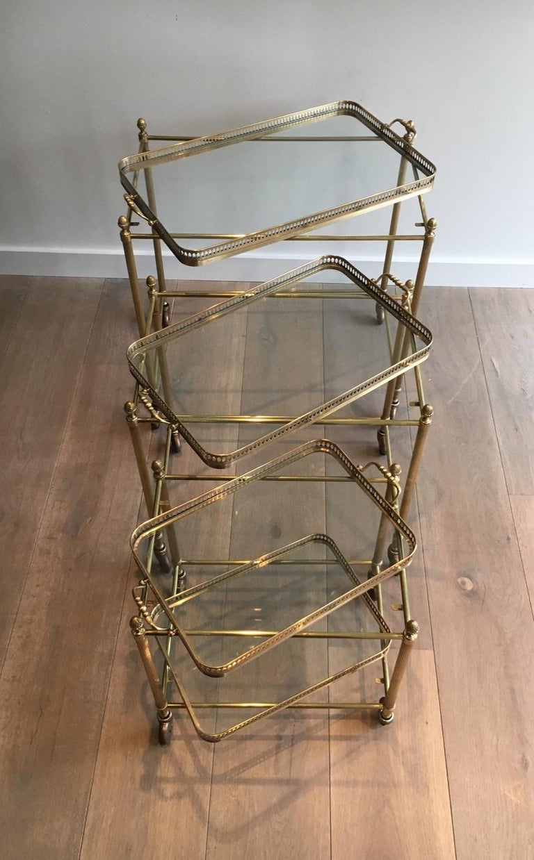 Attributed to Maison Baguès, Set of Neoclassical Brass Nesting Tables on Casters For Sale 12