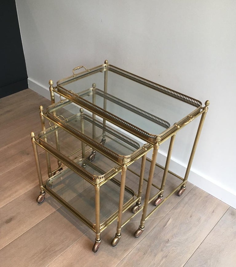 Attributed to Maison Baguès, Set of Neoclassical Brass Nesting Tables on Casters For Sale 15