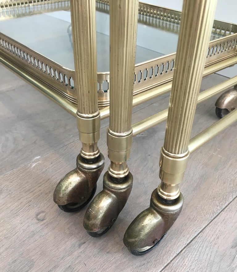 Attributed to Maison Baguès, Set of Neoclassical Brass Nesting Tables on Casters For Sale 3