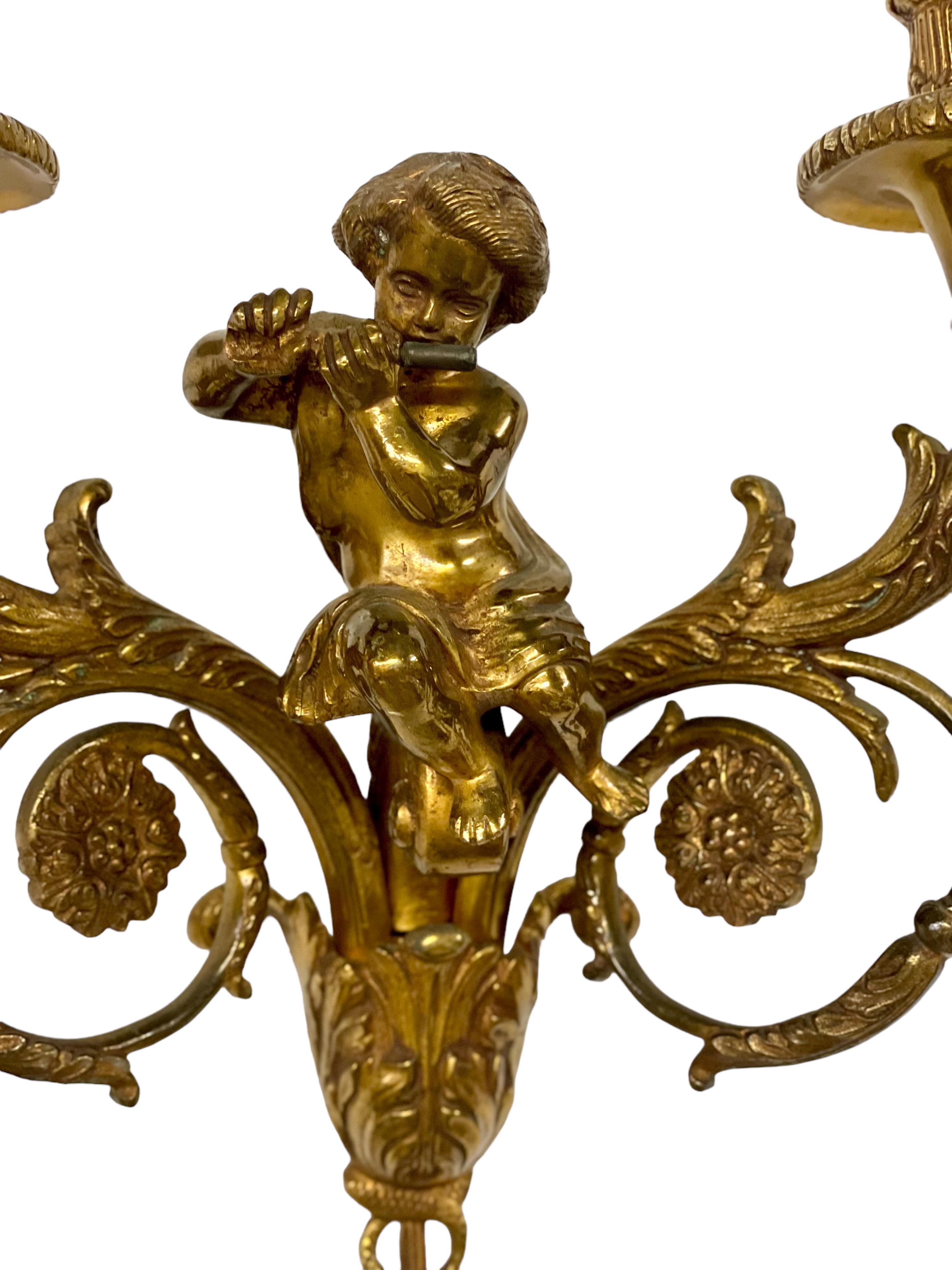 Louis XVI Attributed to Maison Charles Pair of Tall Gilt Bronze Wall Sconces  For Sale