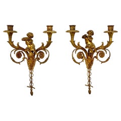 Attribuée à la Maison Charles Paire de grandes appliques murales en bronze doré 