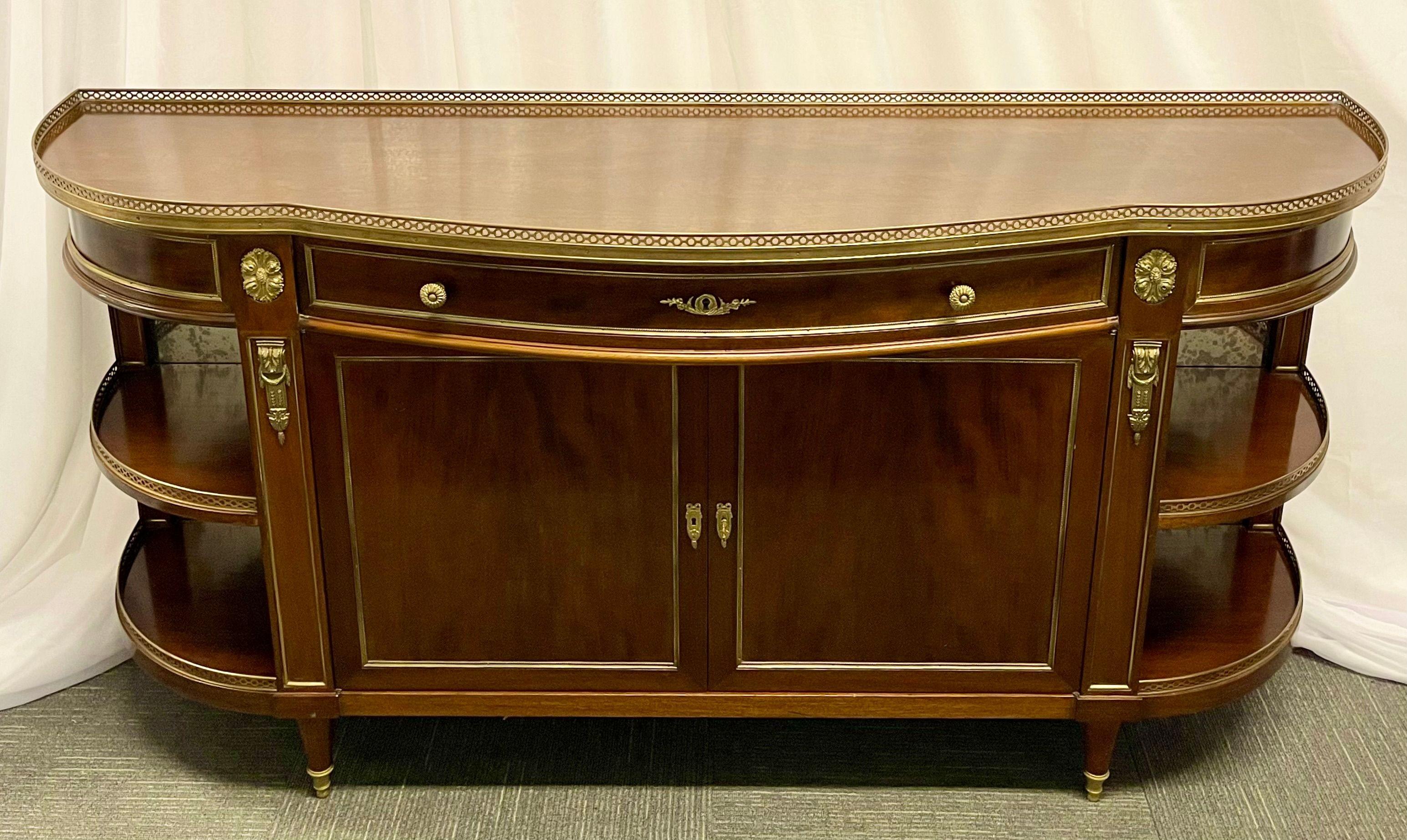 This is a fine attributed Maison Jansen flame mahogany neoclassical server sideboard having a demilune Front. This wonderfully bronze-mounted server or console is a Fine example of this highly acclaimed designers work and dedication to quality. The