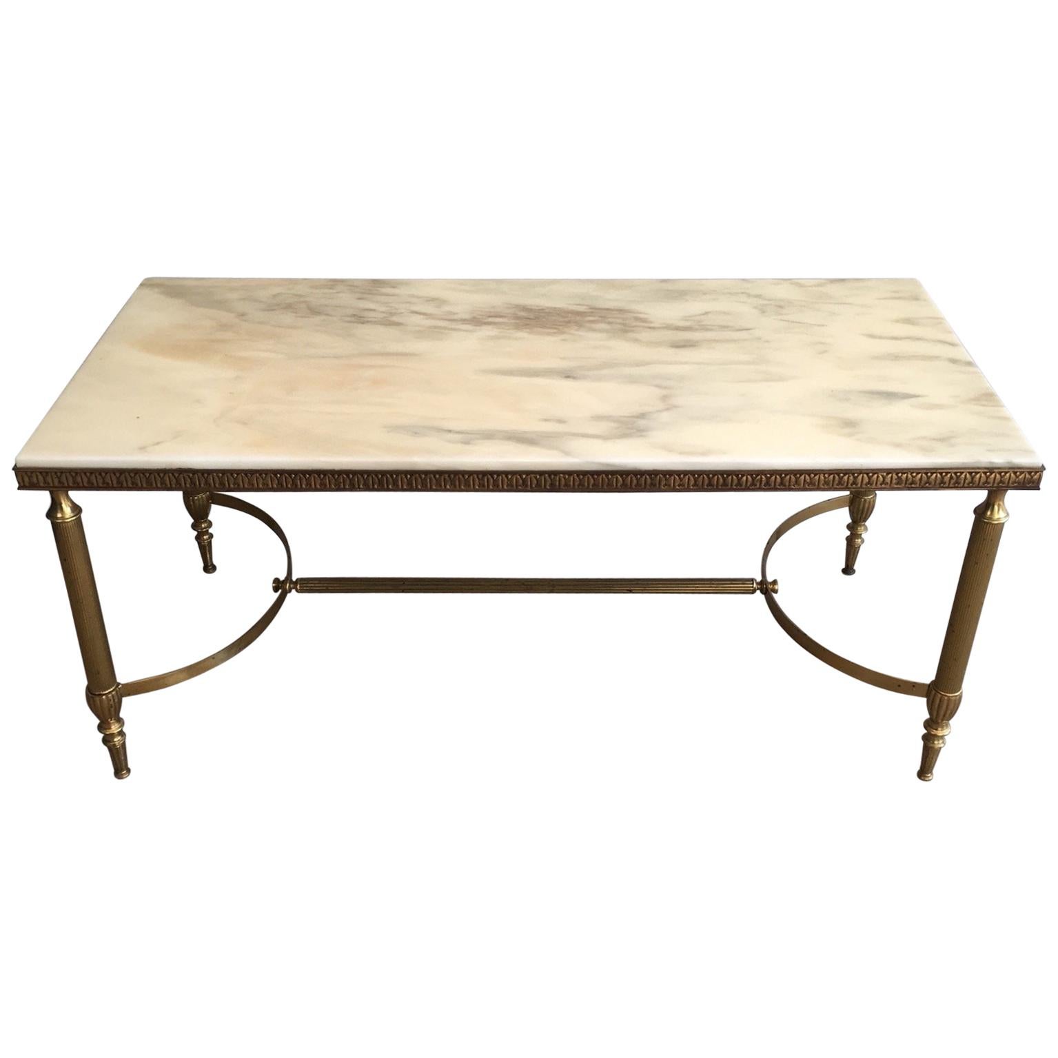 Attribué à la Maison Jansen. Table basse néoclassique en laiton avec plateau en marbre