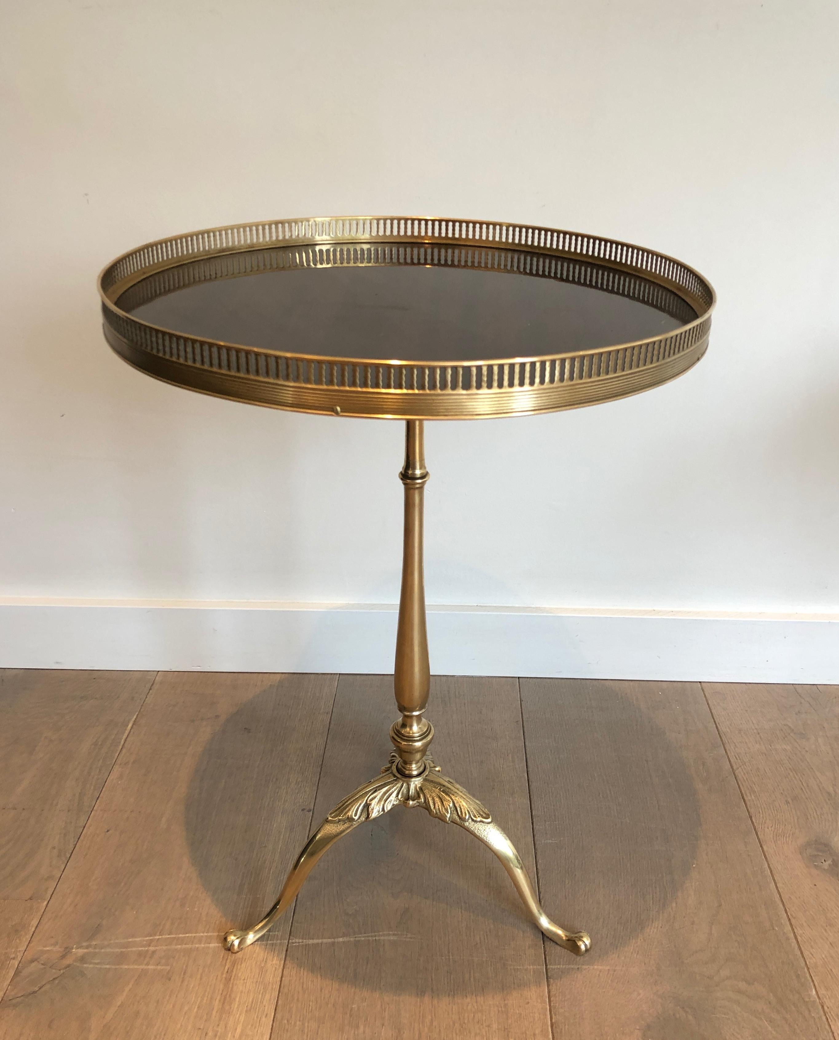 This nice neoclassical style side table also called Martini table is made of brass and mahogany. This end table is attributed to famous French designer Maison Jansen, circa 1940
We have 3 of these tables.