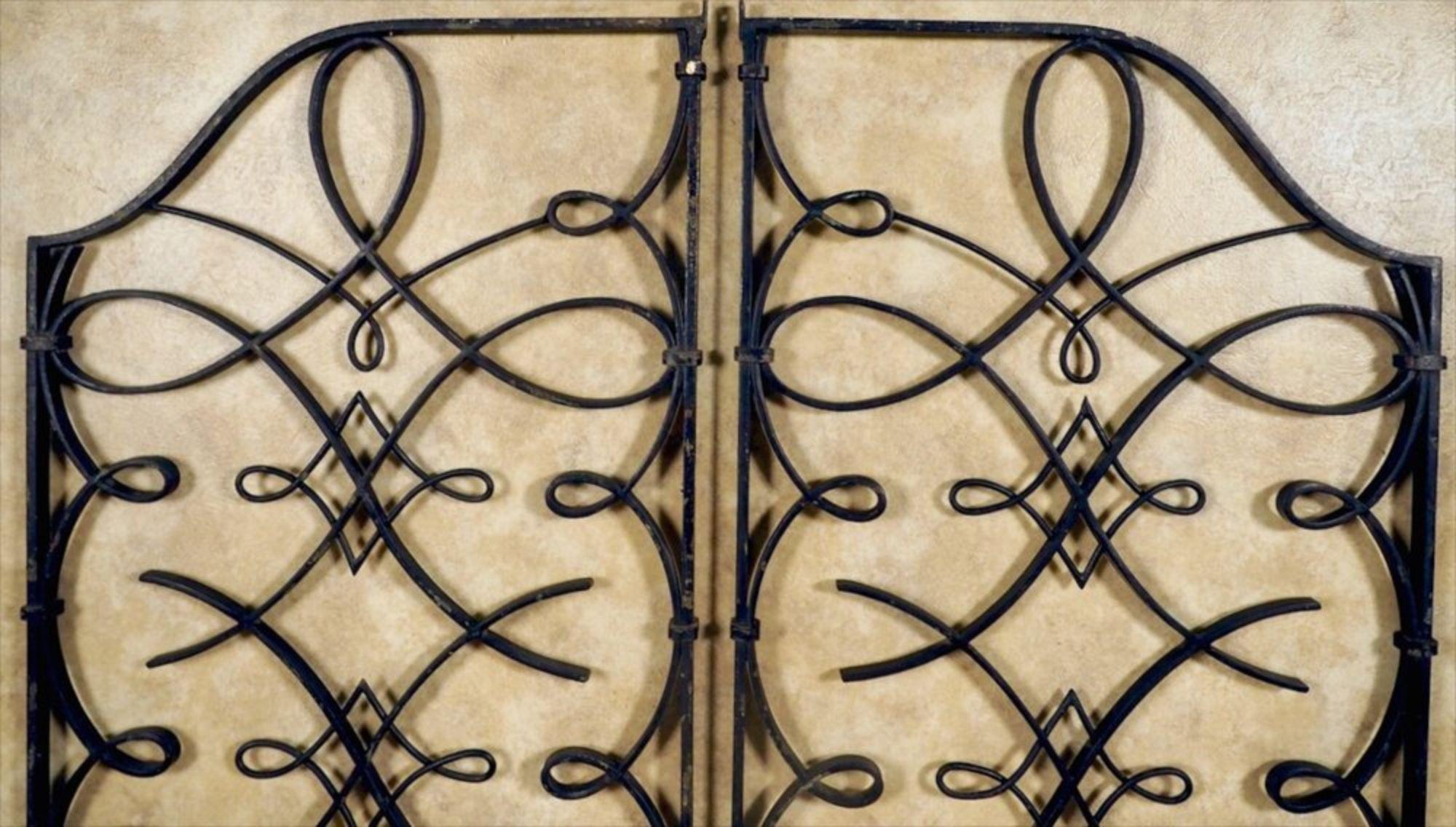 French 1940s hand forged ion grilles/gates, attributed to Rene Prou and likely forged by Raymond Subes.
 Each panel is 23.5” wide x 55” high.