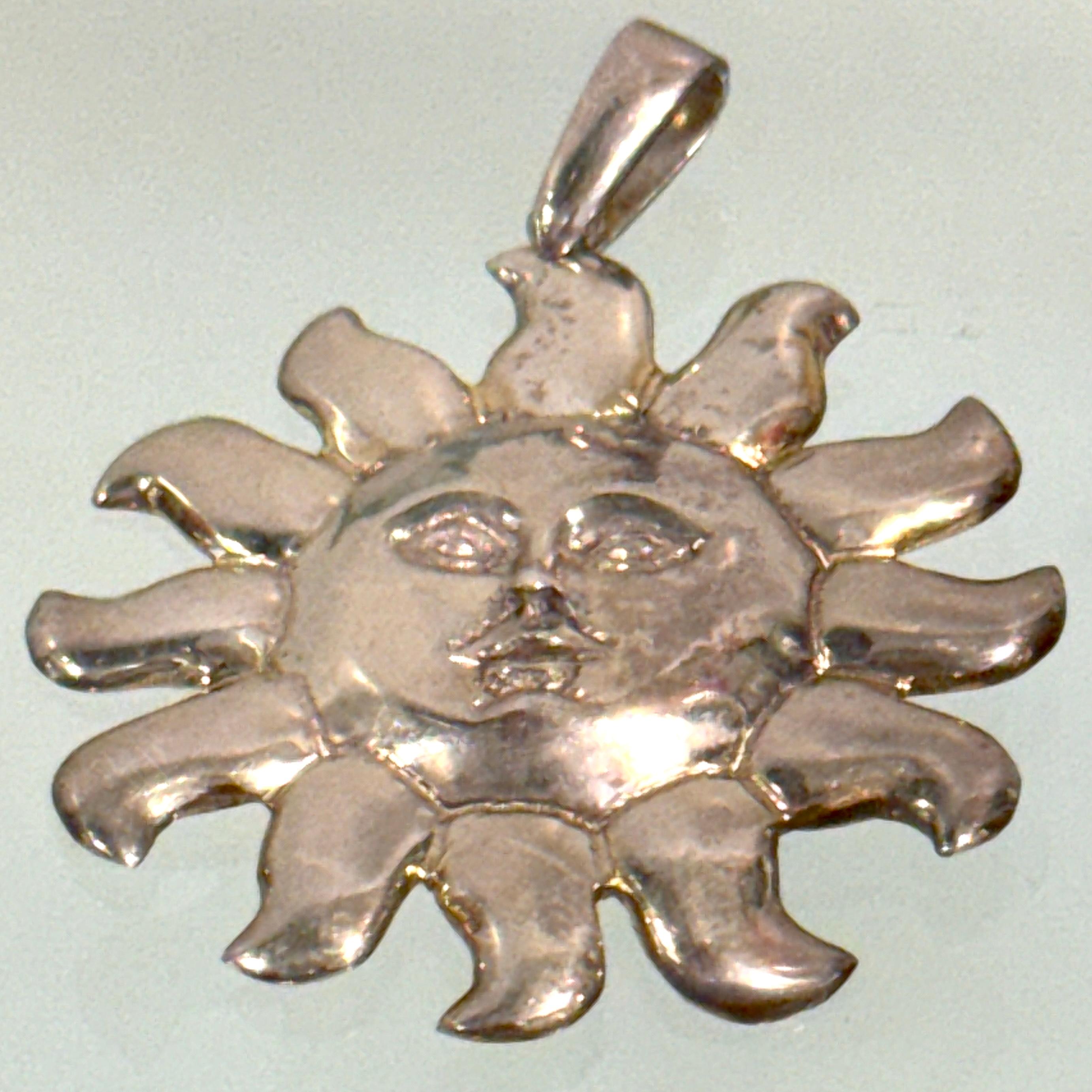 Cast Attributed to Sergio Bustamante, Mexican Sterling Silver Sun Face Pendant, 1990s For Sale
