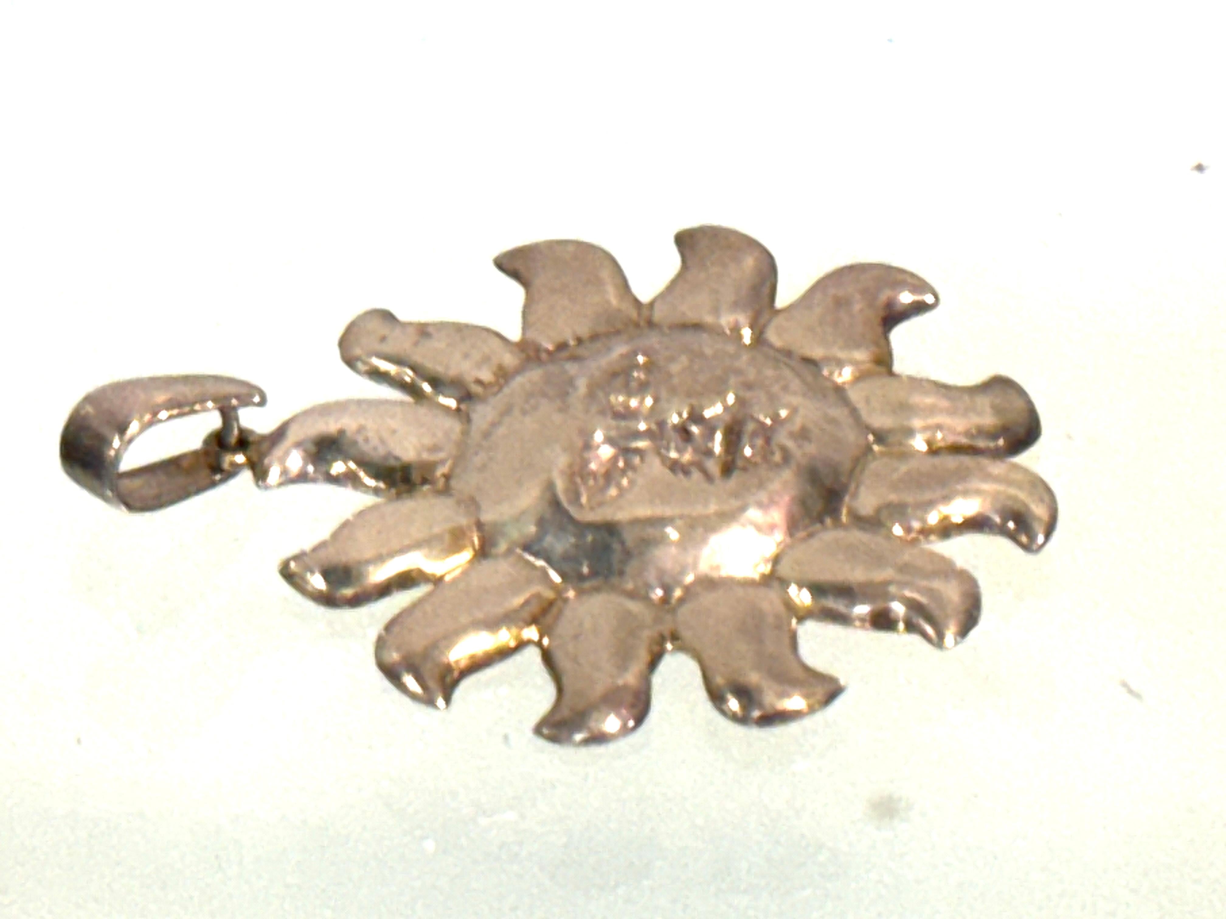 Attributed to Sergio Bustamante, Mexican Sterling Silver Sun Face Pendant, 1990s In Good Condition For Sale In West Palm Beach, FL