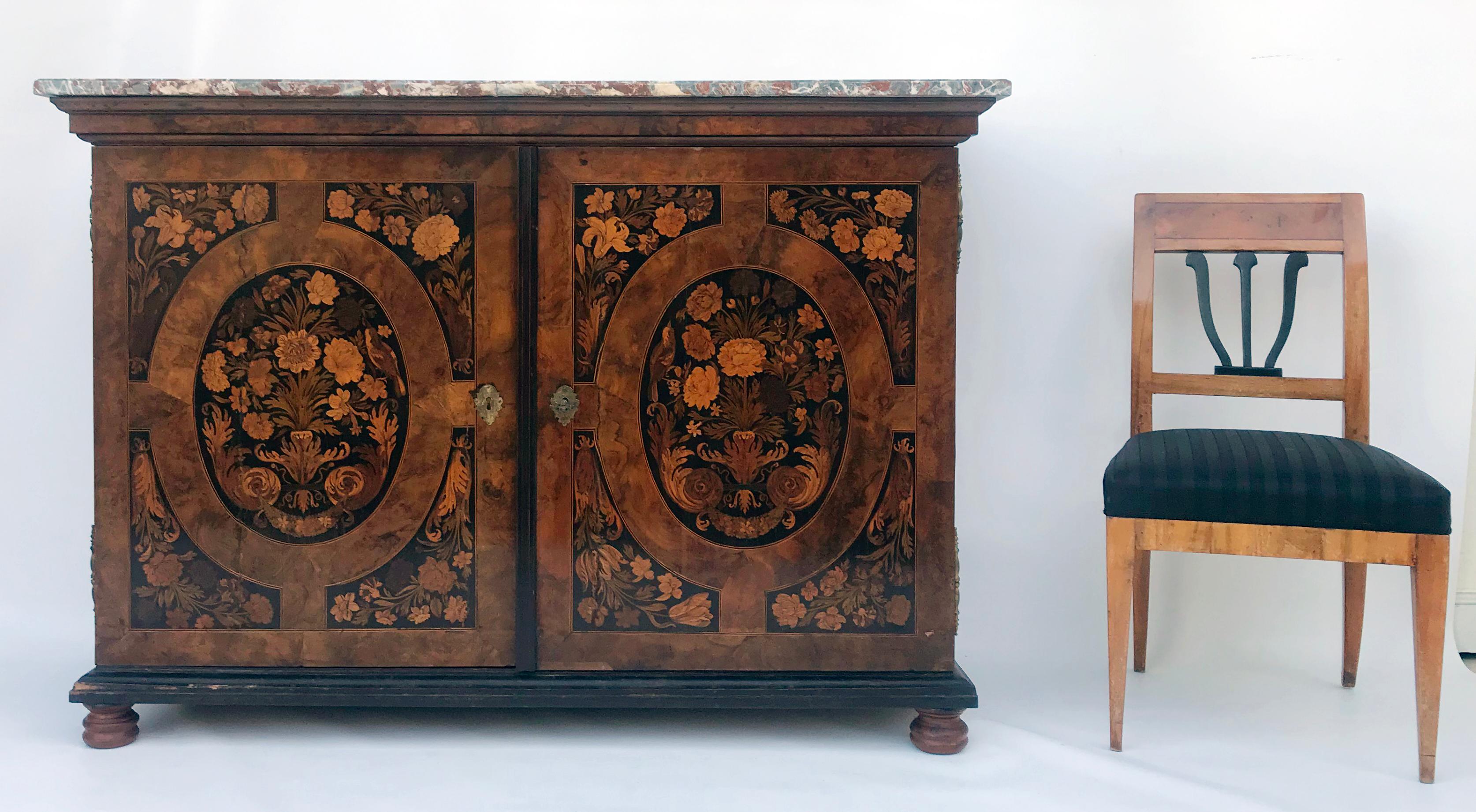 Attributed to Thomas Hache - Baroque sideboard, Grenoble, France, 1740s. Made of walnut and other fine woods. 

Pressed and profiled ball feet, above them a likewise profiled, ebonised strip. Double-door front with large doors extending over the