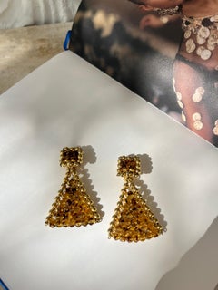 Attributed to Yves Saint Laurent, a pair of unsigned vintage clip-on earrings