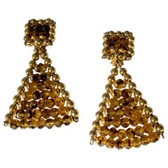 Attributed to Yves Saint Laurent, a pair of unsigned vintage clip-on earrings