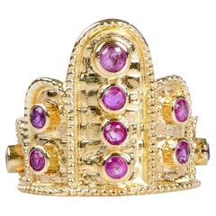 Atypical ring in the shape of a crown in 18-carat yellow gold with 9 rubies