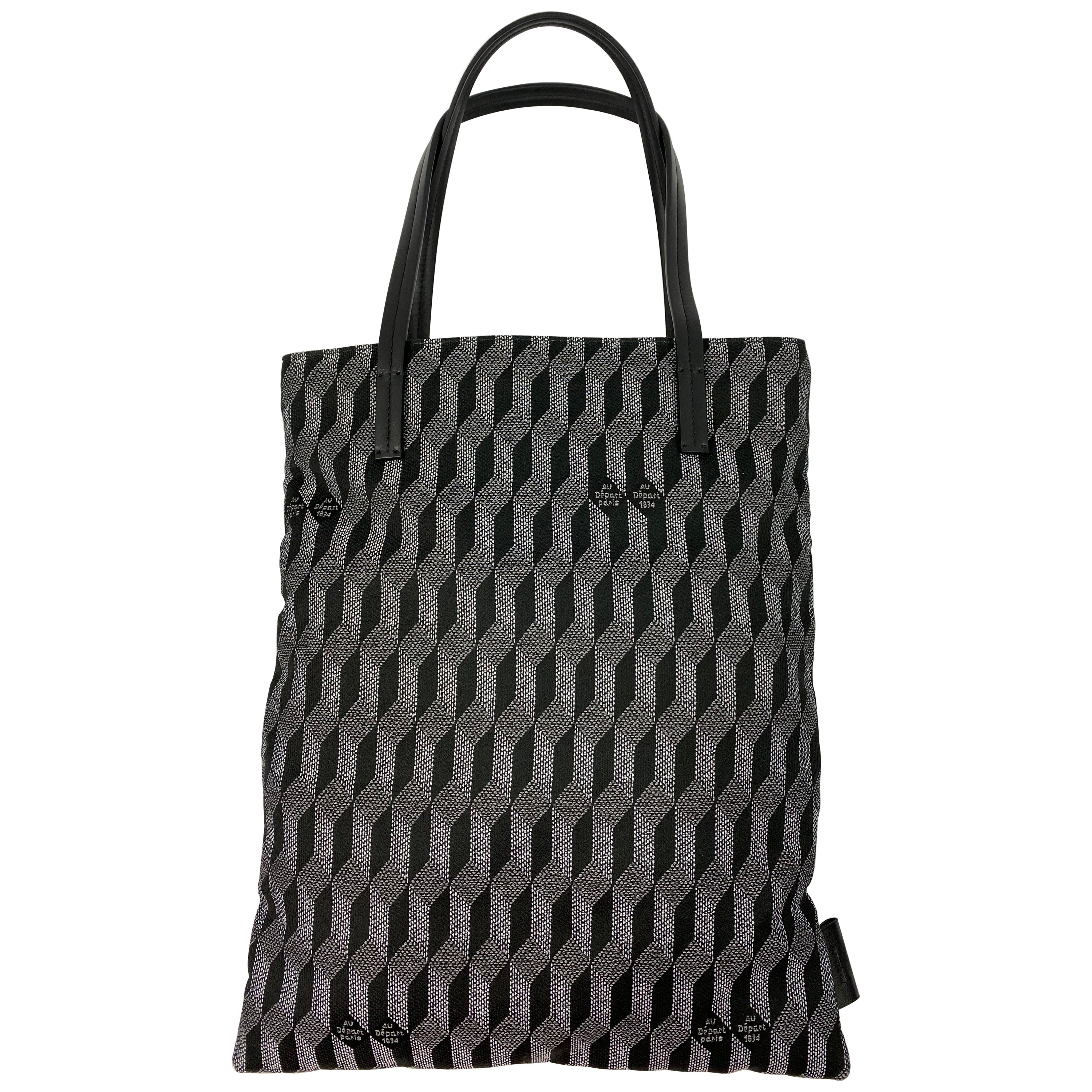 Au Depart  L'europe Schwarze Reflective Tote Handtasche mit Monogramm