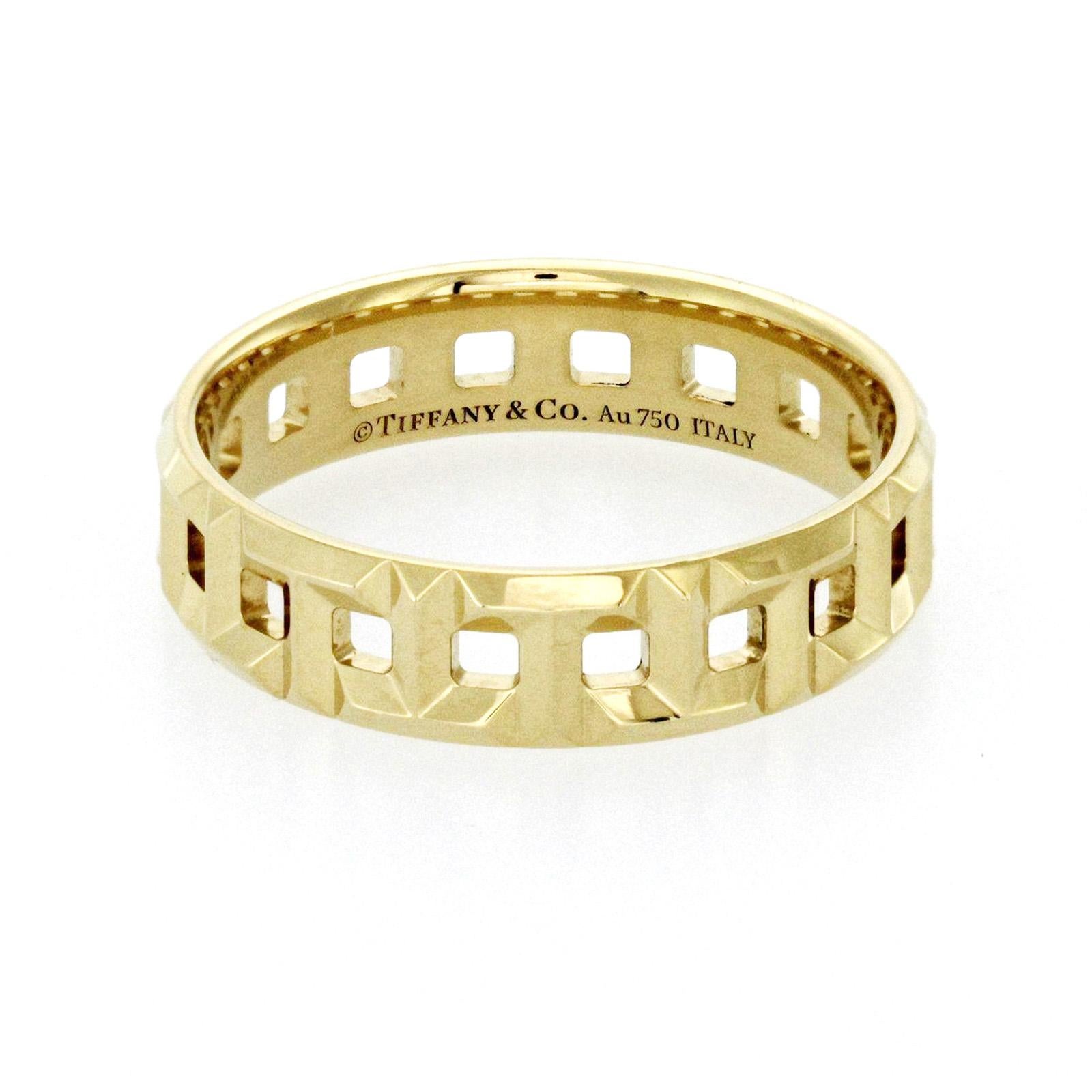 100% Authentic, 100% Customer Satisfaction

Top: 5.5 mm

Band Width: 5.5 mm

Metal: 18K Yellow Gold 

Size: 9.5

Hallmarks: Tiffany & Co 750

Total Weight: 5.4 Grams

Stone Type: None

Condition: Pre Owned

Estimated Retail Price: $1450

Stock