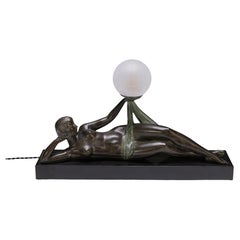 Sculture figurative in metallo
