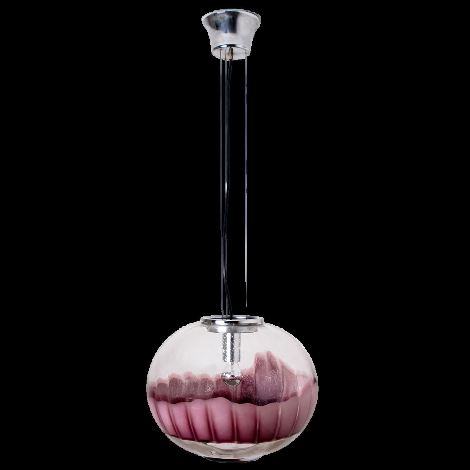 A beautiful and unique pendant light by Mazzega, Italy.
Blown clear and aubergine colored murano glass and a chrome base and finish compose this beautiful piece.

Measures: H 27.24” (120 cm), D 19.70