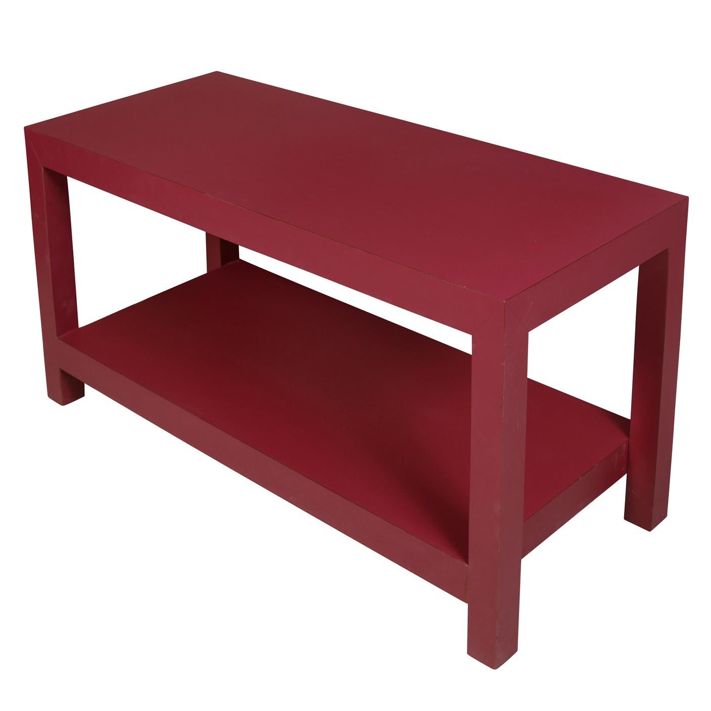 Bright aubergine parsons style two tier console table with lower shelf.