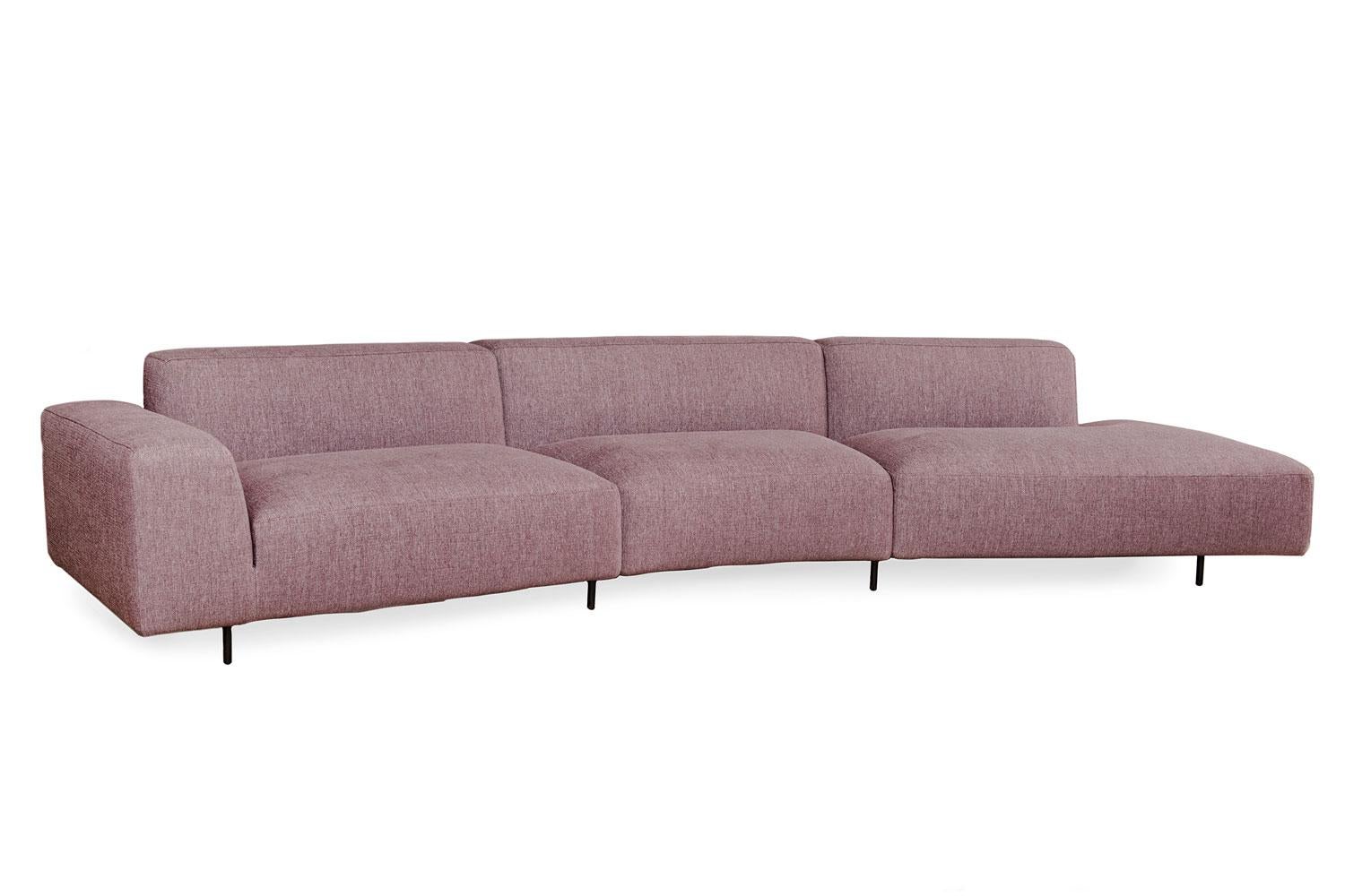 Endless sofa left by Bensen

Covered in a aubergine hue of brown woven fabric, this Endless sectional sofa has a luxurious seat comprised of coils, memory foam, and fiber which gives an overall effect of a well-proportioned unit floating above the