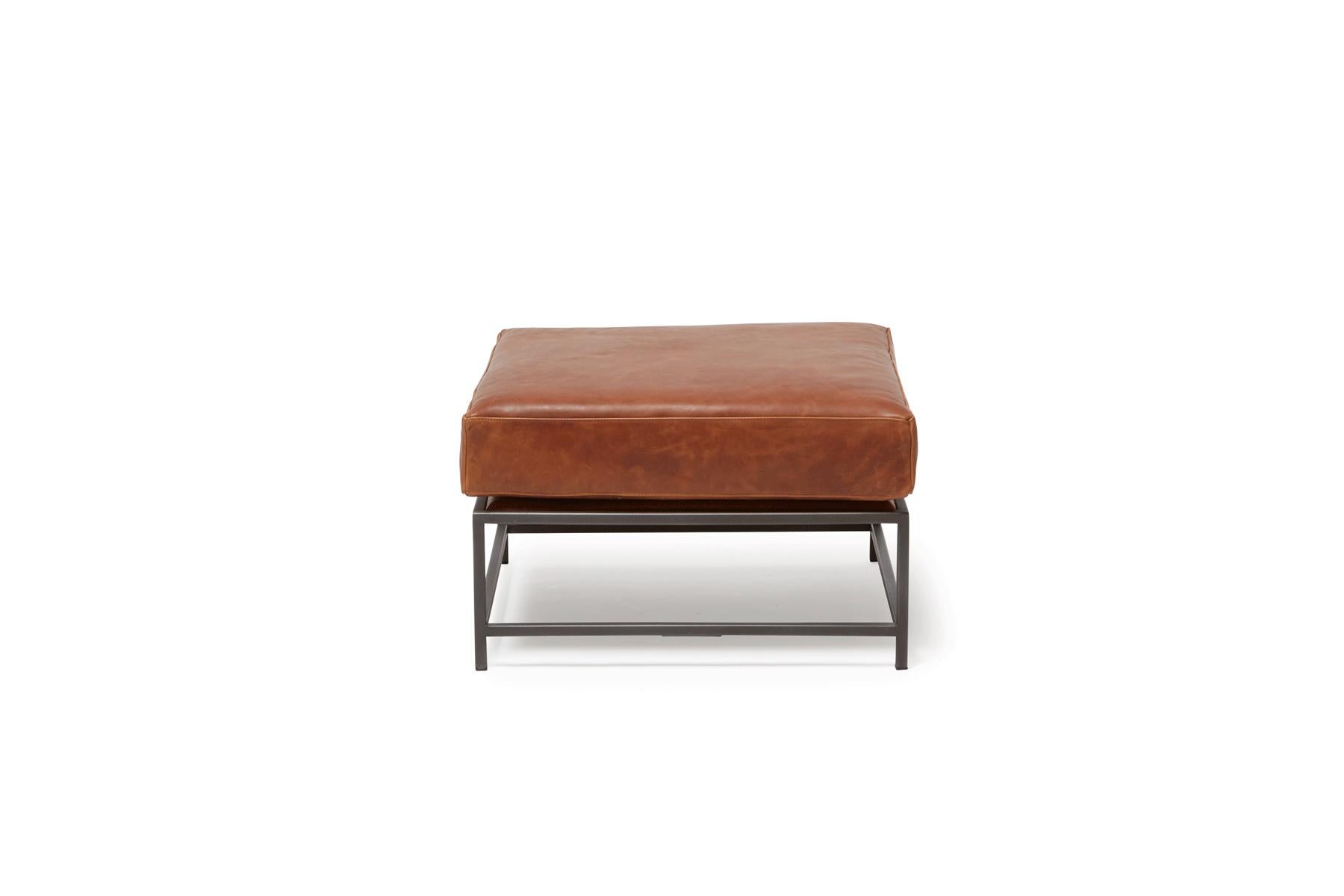 Designed to pair with any of the Inheritance Seating options, the Ottoman is a great addition to add a lounge element to your seating arrangement. 

This variation is upholstered in a rich, warm  auburn brown leather. The foam seat cushions have