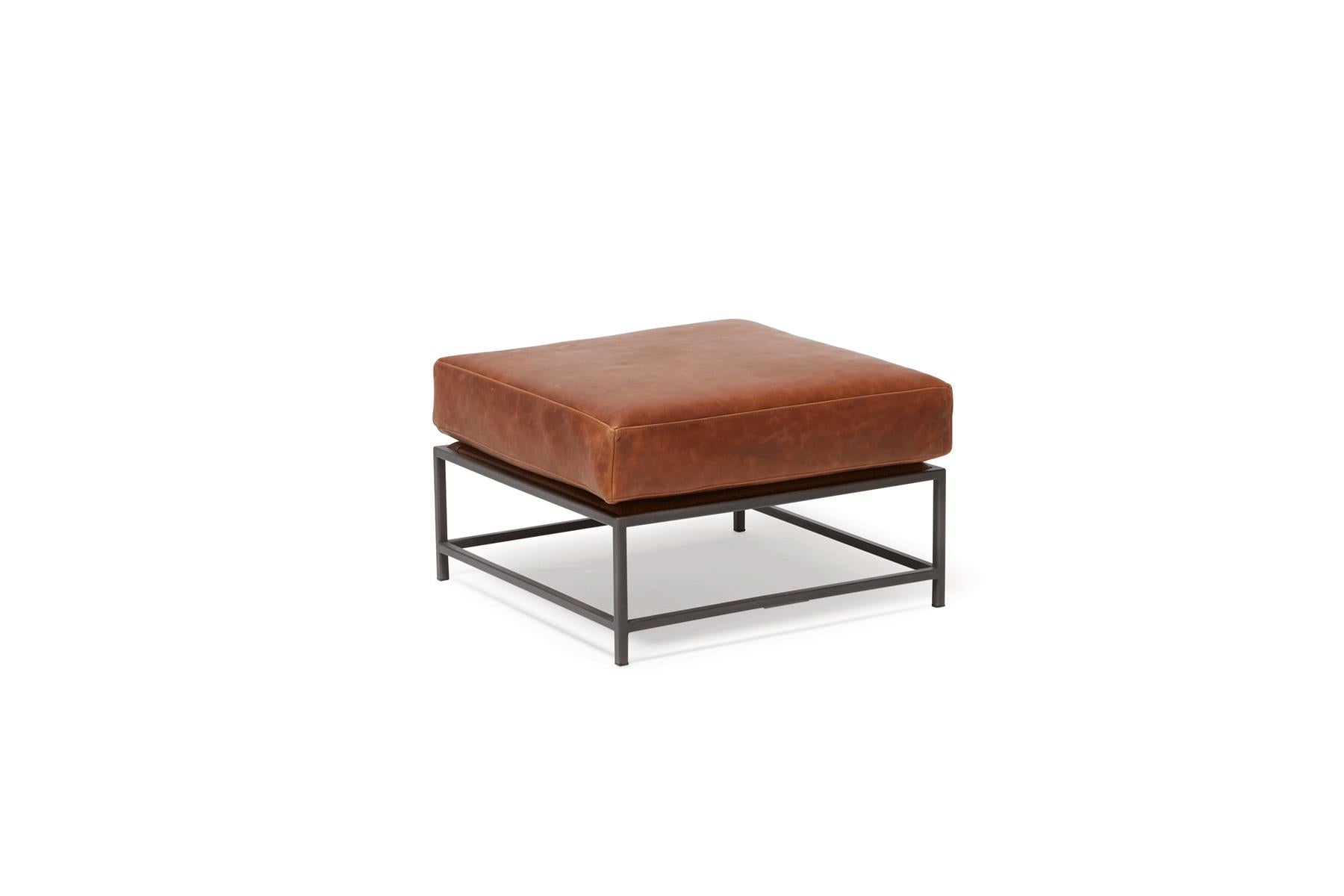 Modern Auburn Leather and Blackened Steel Ottoman For Sale