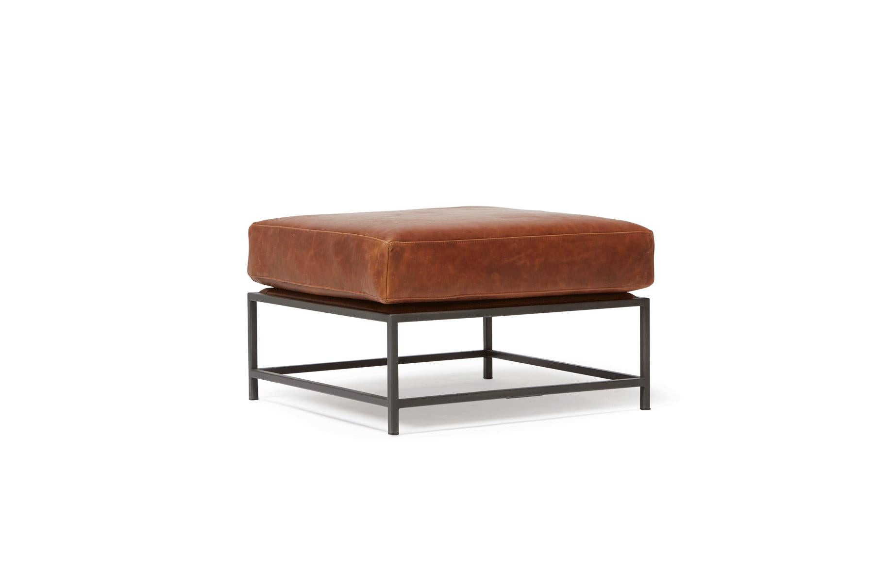 American Auburn Leather and Blackened Steel Ottoman For Sale