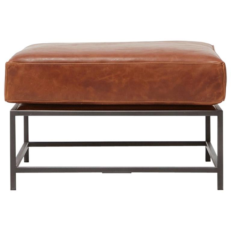 Auburn Leather and Blackened Steel Ottoman For Sale