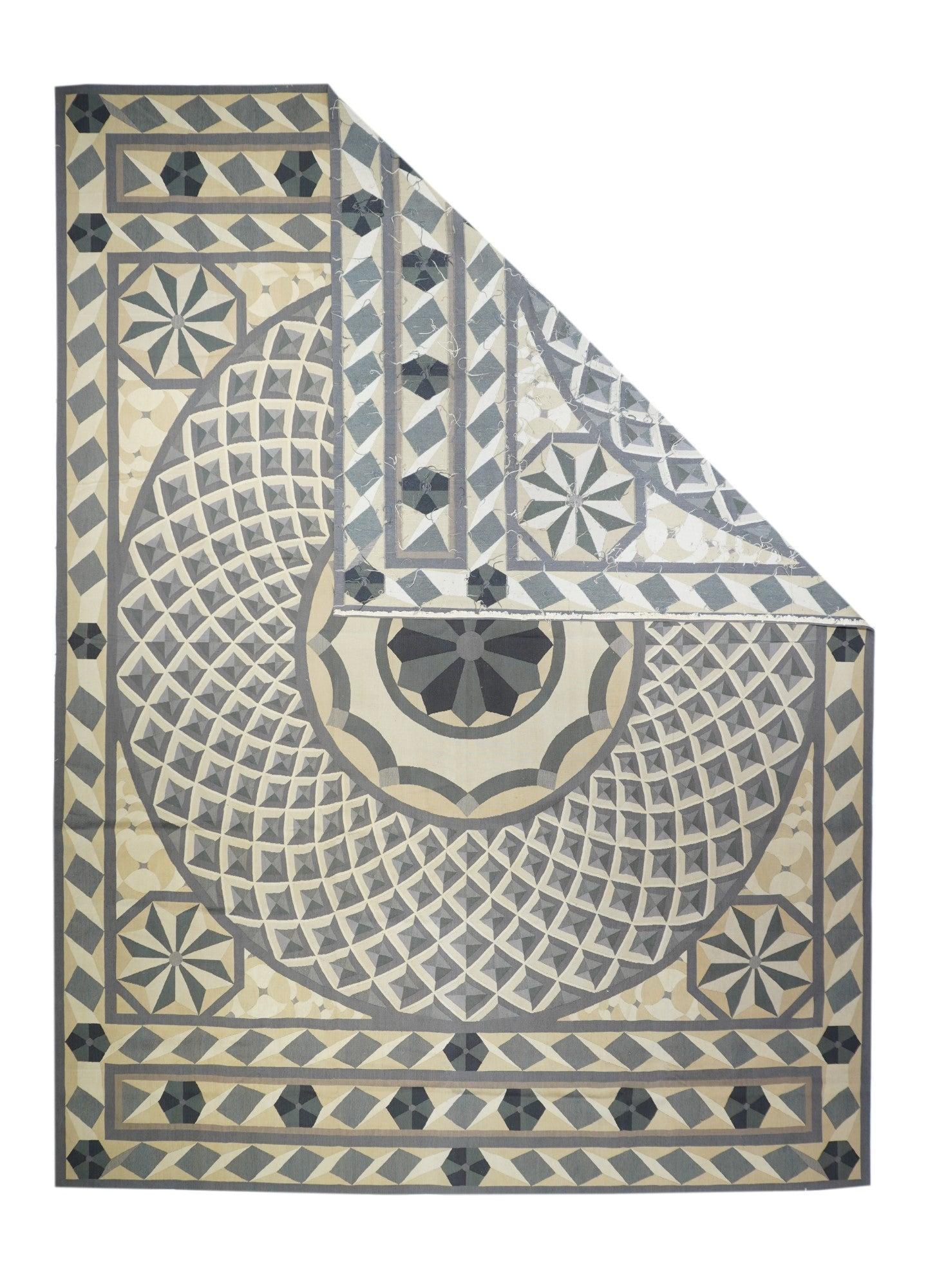 Aubusson Rug 10'2'' x 14'1''. Refers generally to modern carpets in tapestry technique and inspired by French Aubusson designs of the 18th and later centuries. Geometric or semi-floral. Scatters to room sizes. Recent pieces are usually Indian. Wool