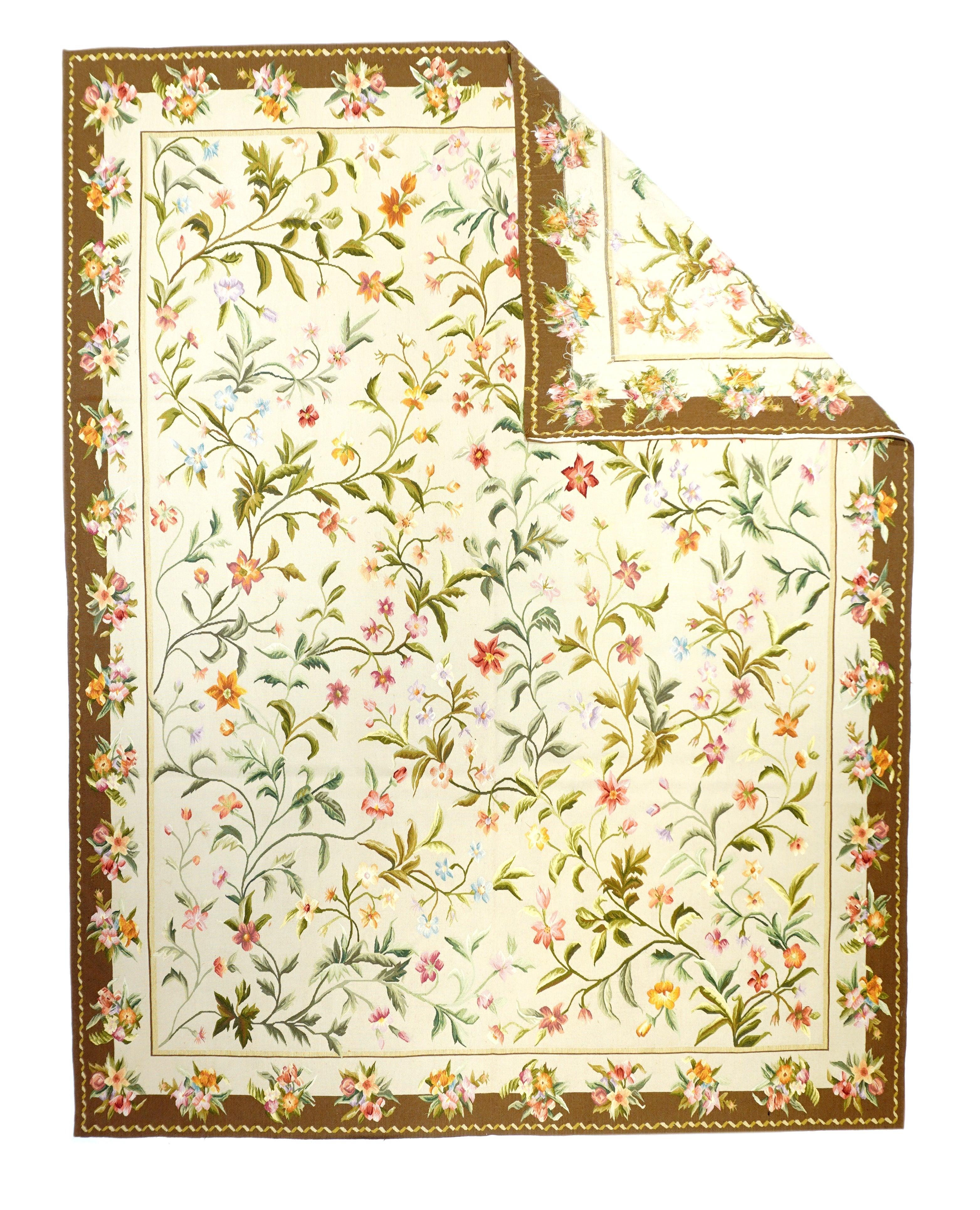 Aubusson Rug 8' x 10'. Refers generally to modern carpets in tapestry technique and inspired by French Aubusson designs of the 18th and later centuries. Geometric or semi-floral. Scatters to room sizes. Recent pieces are usually Indian. Wool pattern