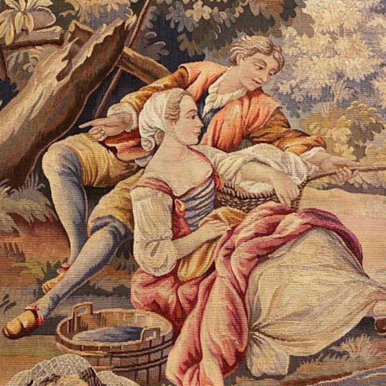 Ein Wandteppich aus Aubusson, der eine pastorale Szene darstellt.

Der Wandteppich zeigt eine pastorale Szene mit einem jungen Paar, das am Ufer eines Baches angelt, mit einer Brücke und ländlichen Gebäuden in der Ferne.

Aubusson

Die kleine