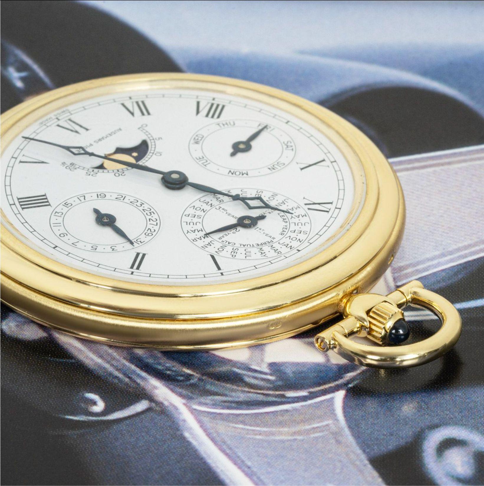 Audemars Piguet. A Yellow Gold Keyless Lever Perpetual Calendar Pocket Watch C1970

Dial: The Beautiful white enamel dial with Roman numerals outer minute track with subsidiary dials for the four year perpetual calendar cycle at twelve o'clock , the