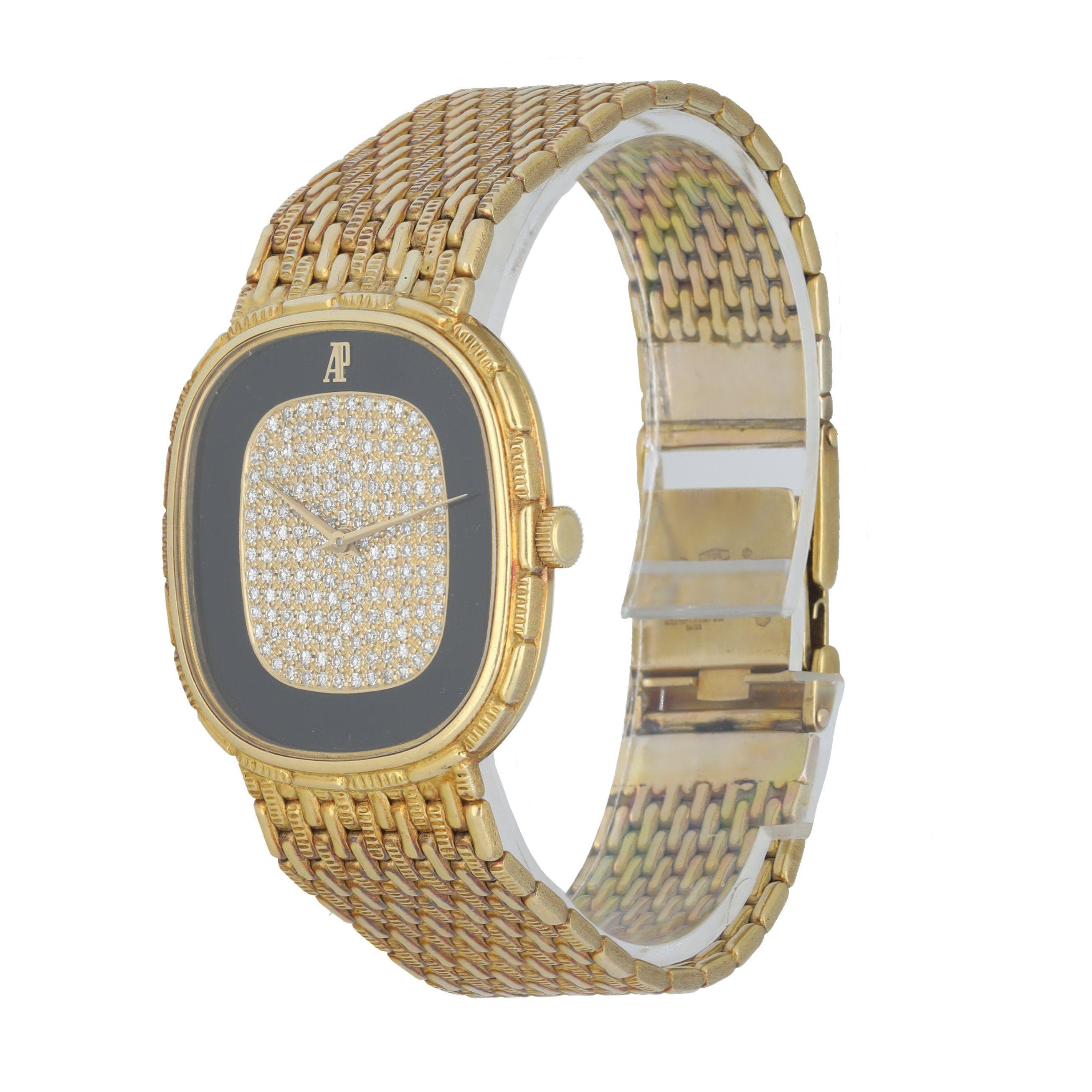  Audemars Piguet watch, 30MM 18K yellow gold case with bezel. Onyx and diamond dial with gold hands. Sapphire crystal and 18K yellow gold case back. 18K Yellow gold bracelet with jewelry clasp. Will fit up to 6-Inch wrist.
 This watch is backed by