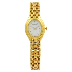 Audemars Piguet Montre pour femme en or jaune 18 carats à cadran ovale et cadran blanc à remontage manuel