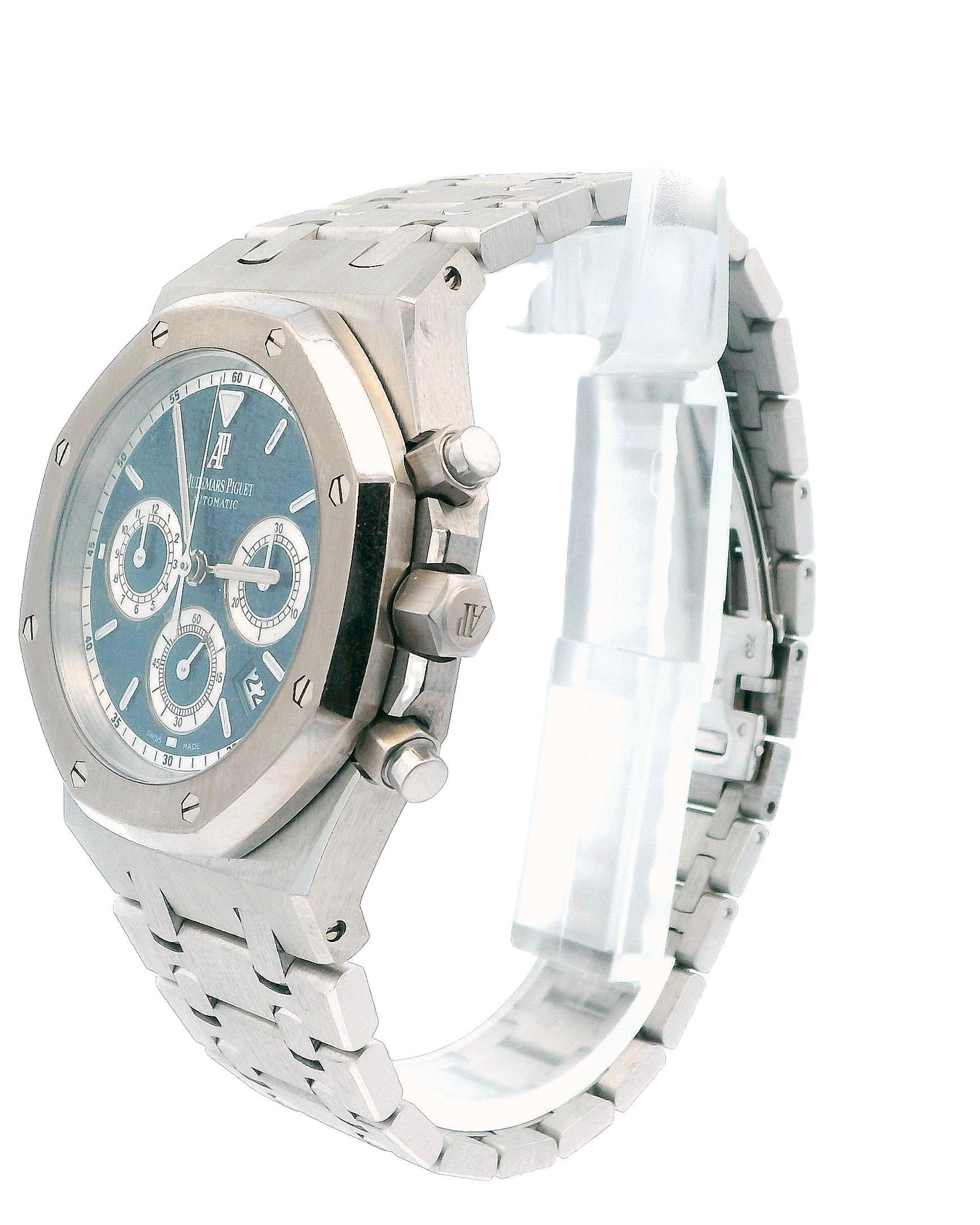 Audemars Piguet 26022BC Royal Oak men's watch. 39MM 18K white gold case with 18K white gold octagon-shaped bezel. Blue tapestry dial with luminous hands and luminous index hour marker. Date display between 4 & 5 o'clock position. Subdials features a