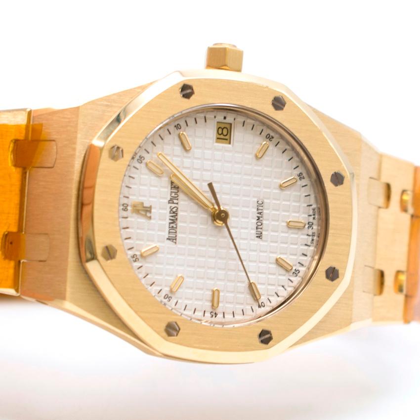 Audemars Piguet 37mm Octagonal Royal Oak 18K Yellow Gold Watch

- Automatic movement
- Swiss Made
- Octagonal White Dial
- 37mm 
- 18ct Yellow Gold Strap and Case
-Sapphire crystal glass face
- Triple Folding Clasp
- Water resistant to 500m
- Has