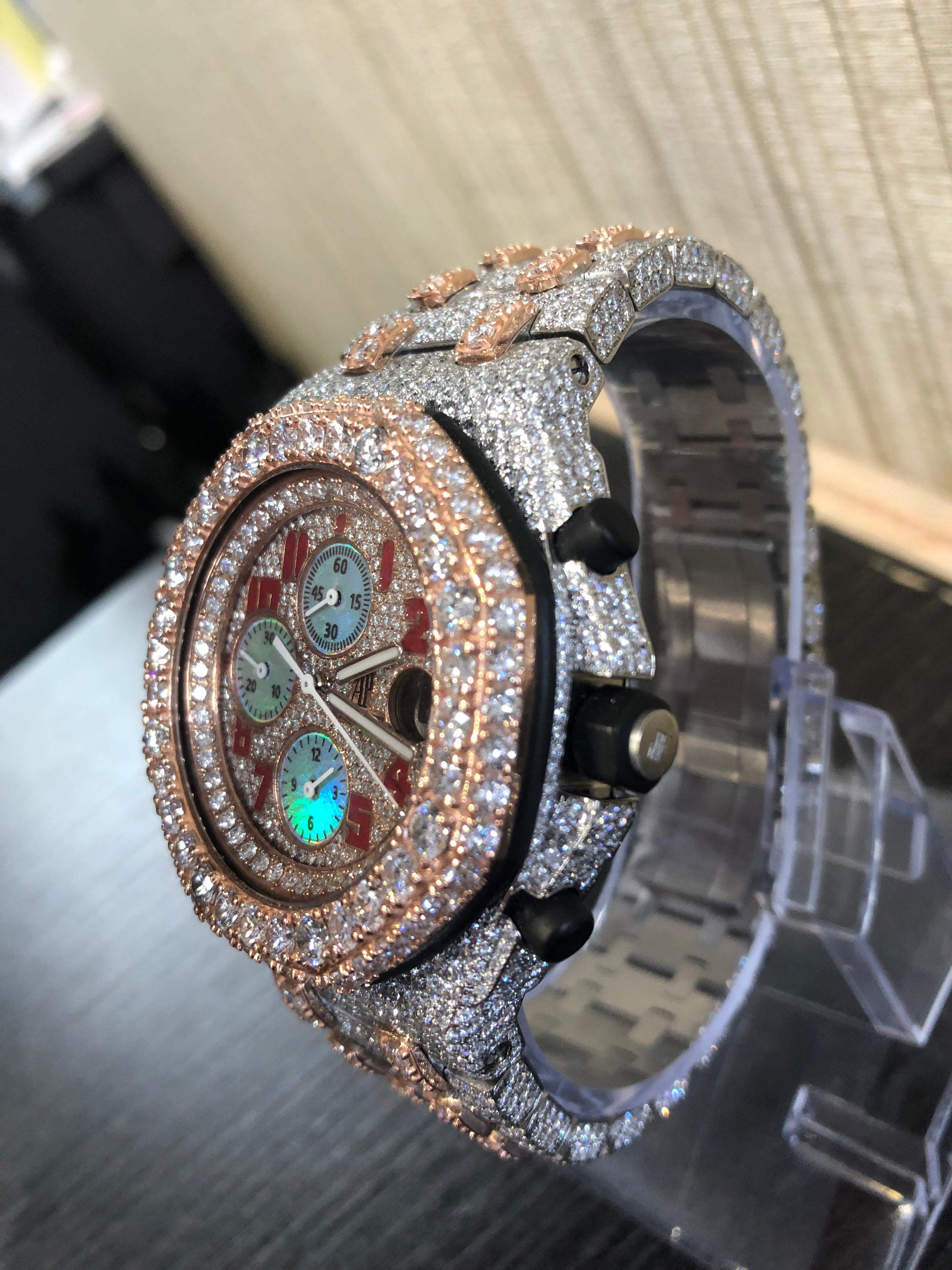 Audemars Piguet Offshore 18K Gold and Stainless Steel  Iced Out 45 Carats Diamonds

multi color Diamond Dial

excellent condition
 collection diamonds 42 carats

This watch is all original Audemars Piguet

this watch was customized by replacing the