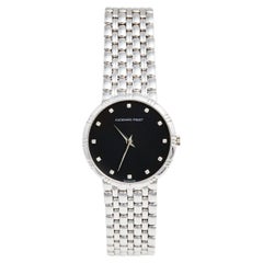 Audemars Piguet Montre-bracelet classique pour femme 31 mm avec cadran noir et diamants 18 carats