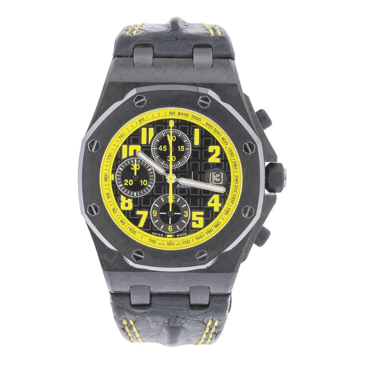 Brand - Audemards Piguet

Model - 26176FO

Dial - Black Tapestry dial with Yellow numerals and highlights

Case - Carbon fiber case

Bracelet - Double fold AP Clasp leather strap

Movement - Automatic

Bezel - Black ceramic bezel

Includes -