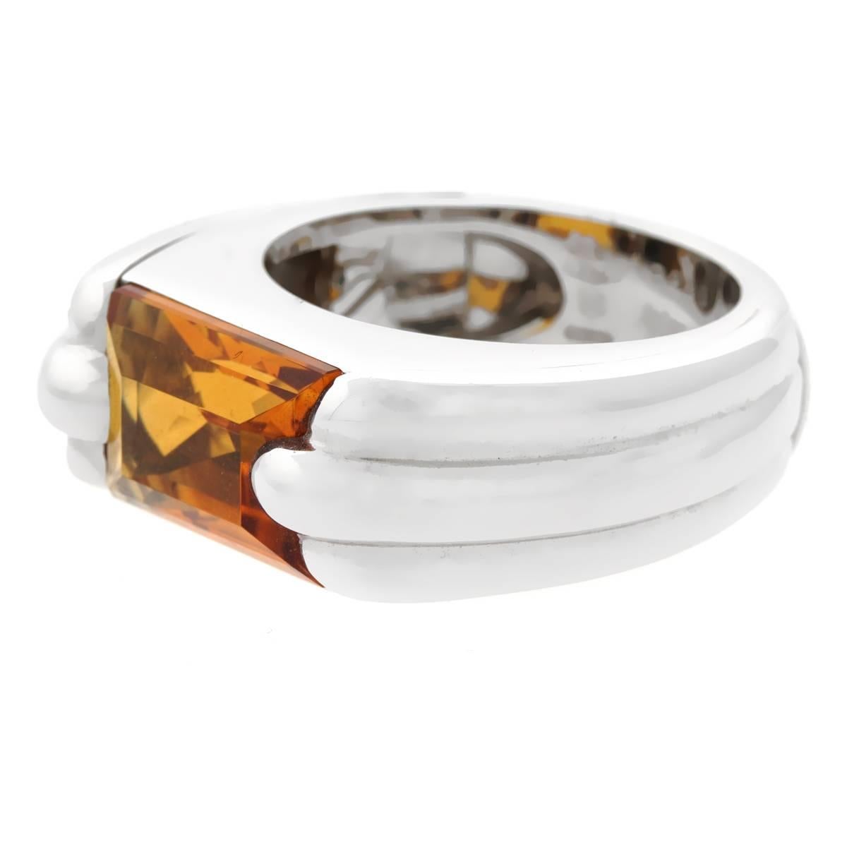A chic Audemars Piguet ring featuring a citrine gemstone set in 18k white gold. Size 6.5

Sku:880