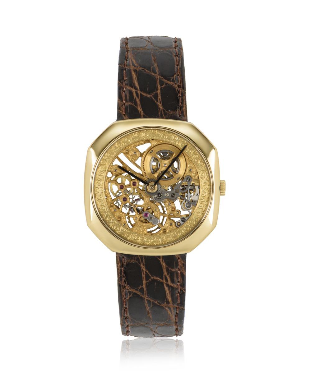 A rare and exceptional yellow gold 28mm Classical men's wristwatch with an opulent, highly decorated manual wind movement. This allows through its design and construction, the space to see through it.

The name skeleton derives from the ability to