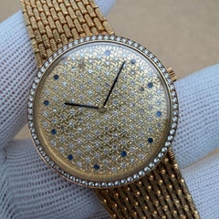 Audemars Piguet Cobra 31mm 18K Yellow Gold Sapphire Dial Watch