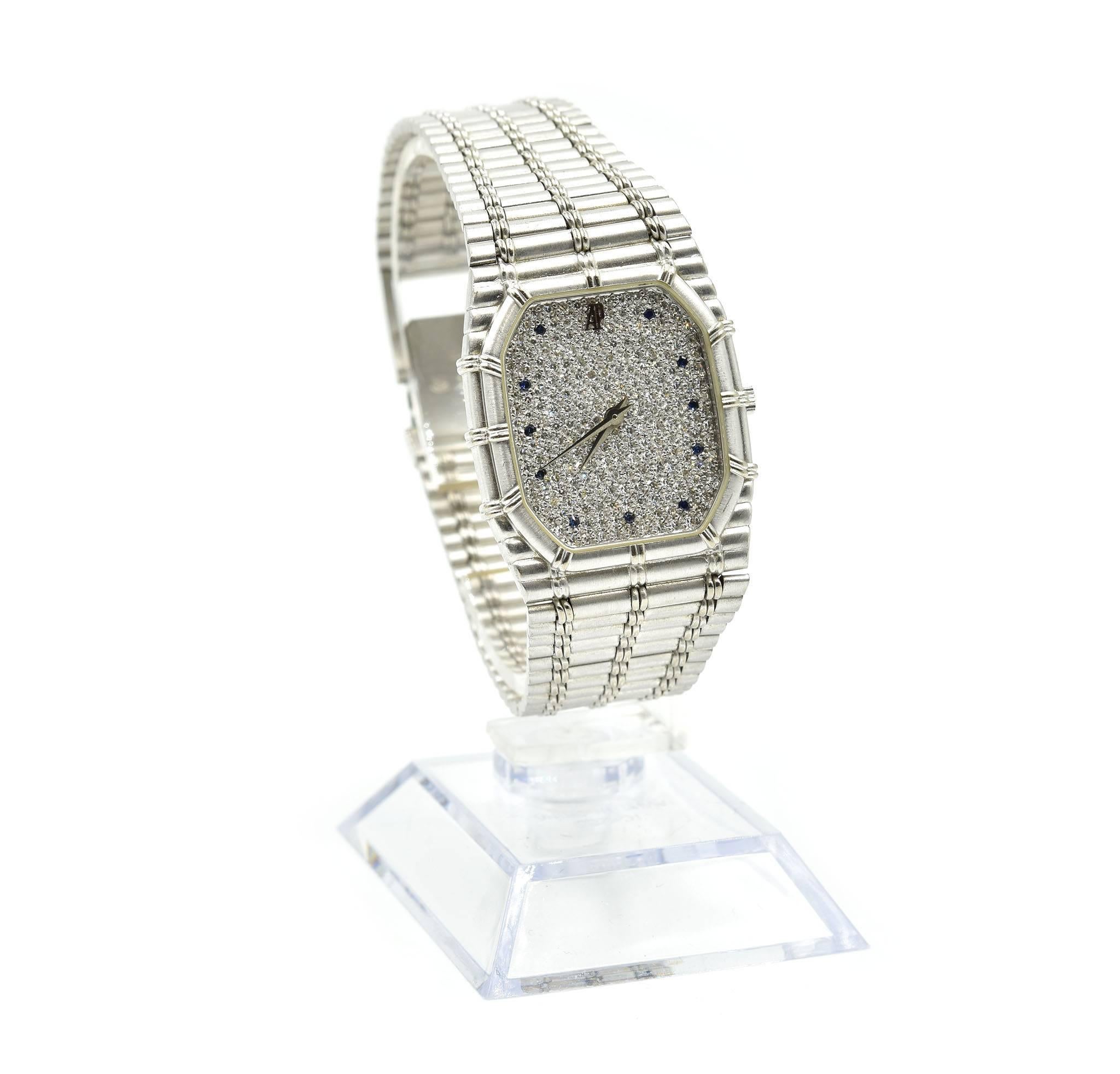 Movement: cal. 2003-1 quartz movement
Function: hours, minutes
Case: rectangular 32mm x 27mm 18k white gold case with bamboo-form bezel, sapphire crystal, solid case back secured with four screws, pull/push crown
Band: 18k white gold integrated